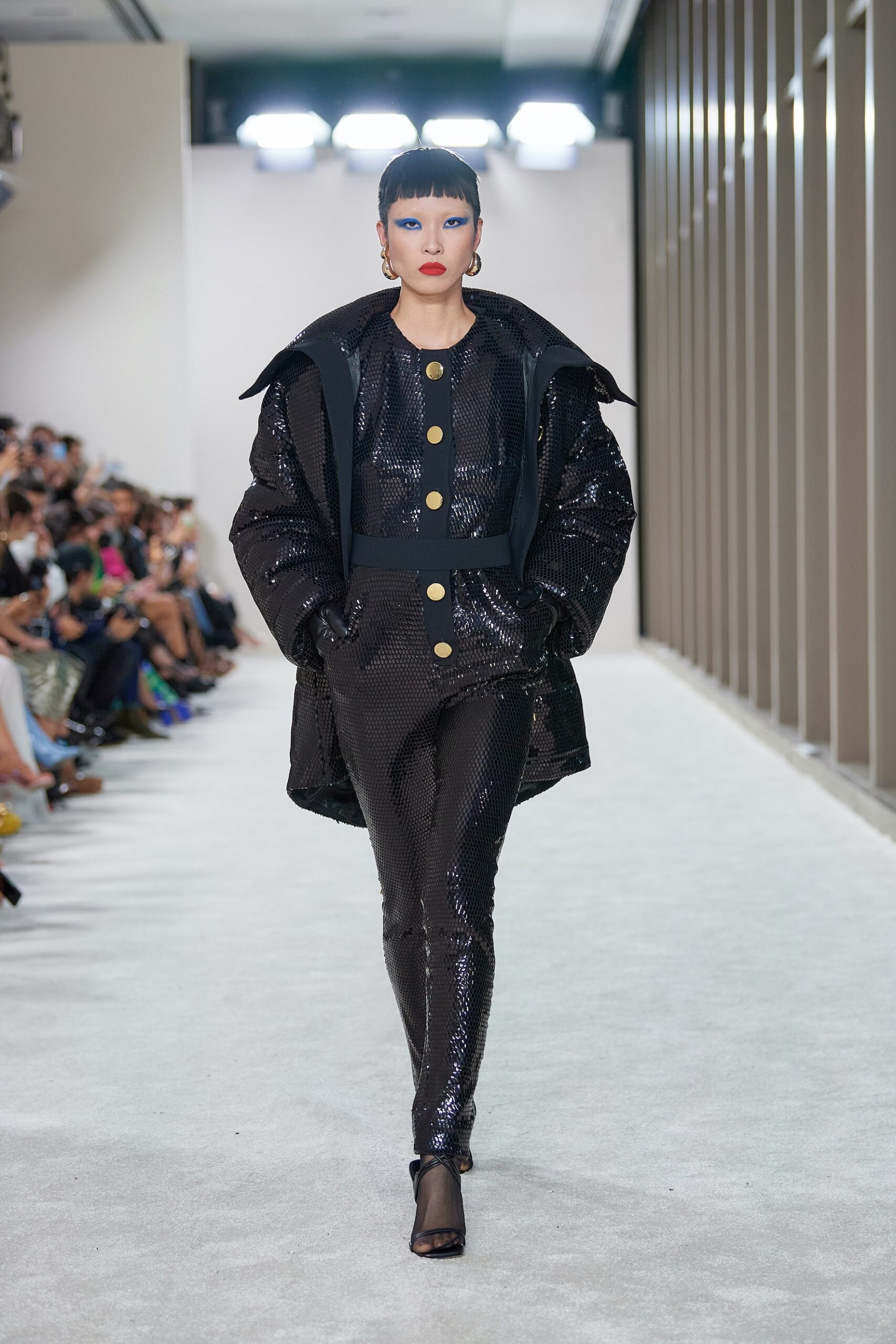 black vinyl long-sleeve collared oversized buttoned shiny coat