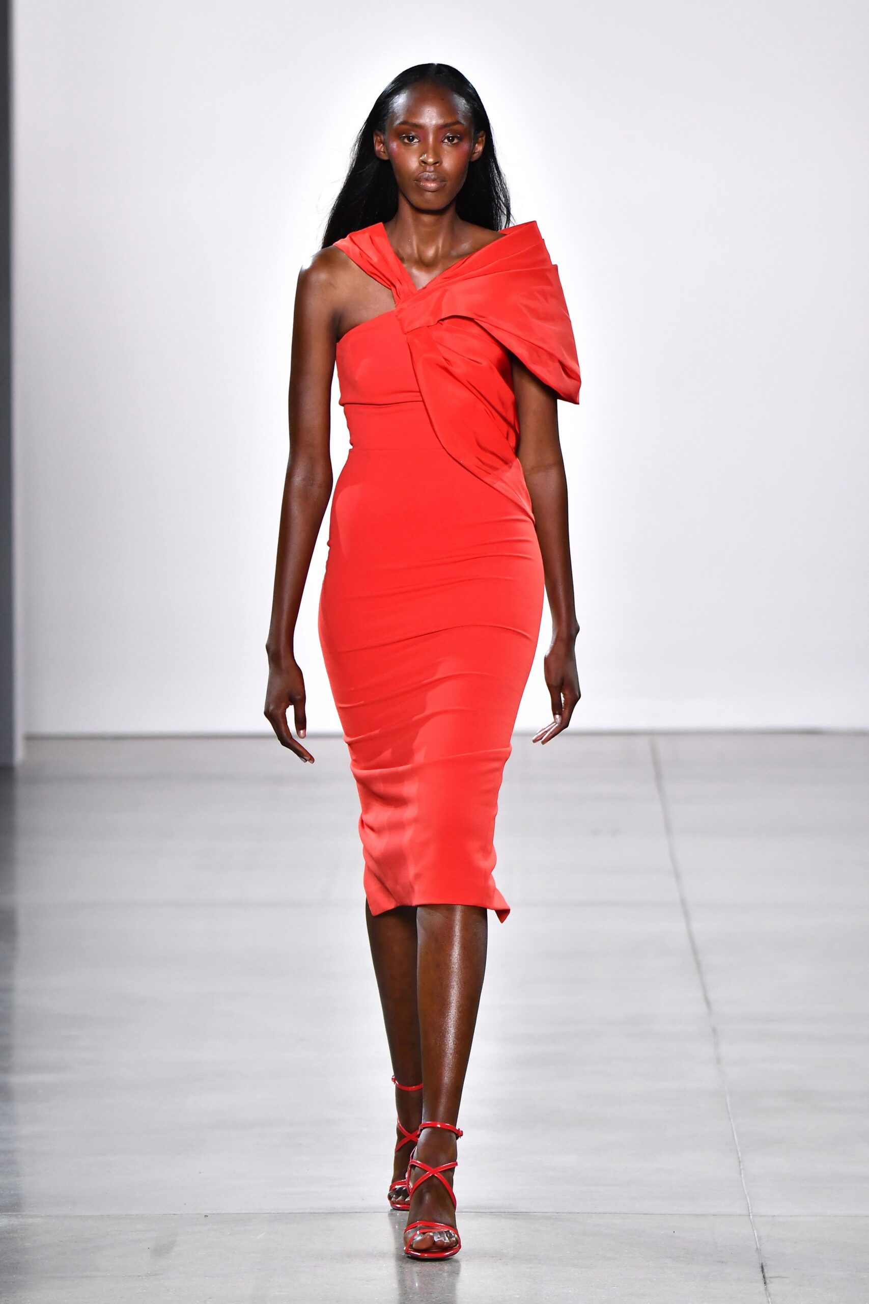 fitted red silk off-shoulder dress