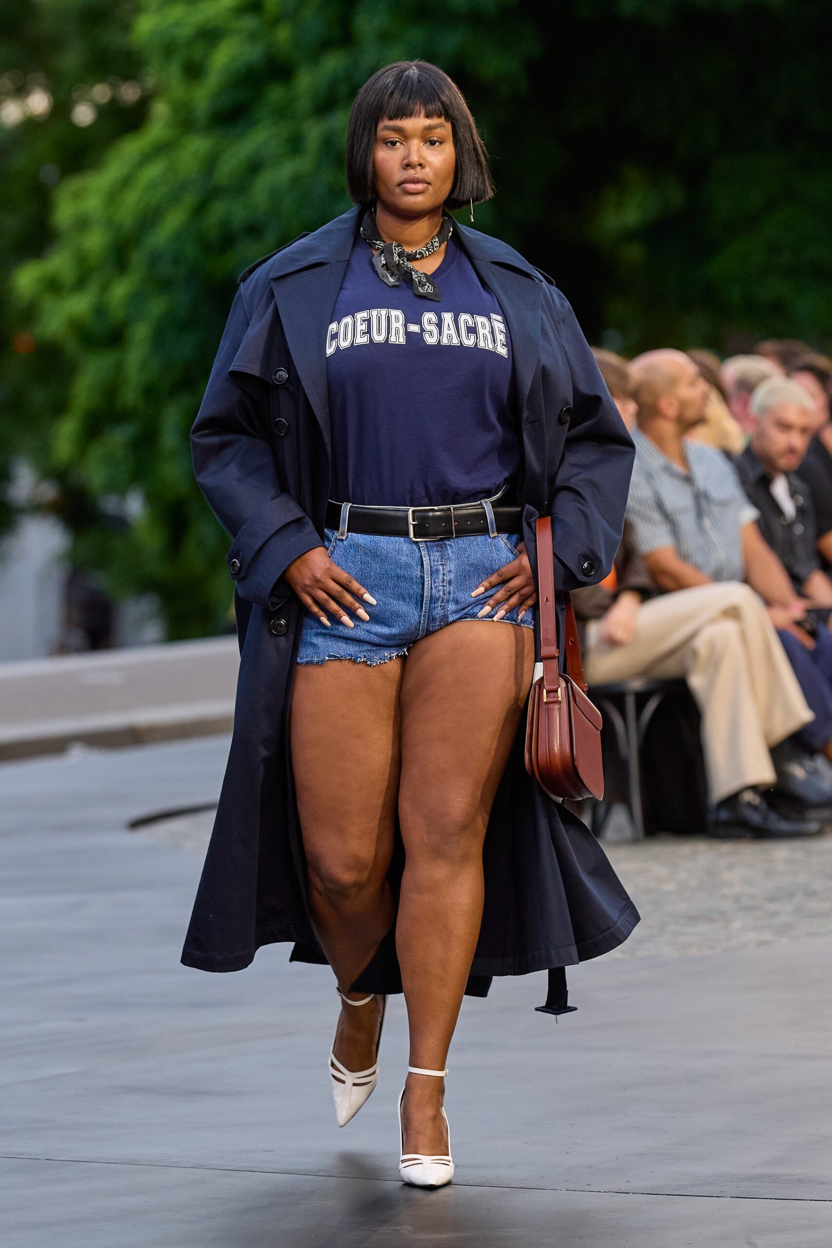 navy trench coat with denim shorts