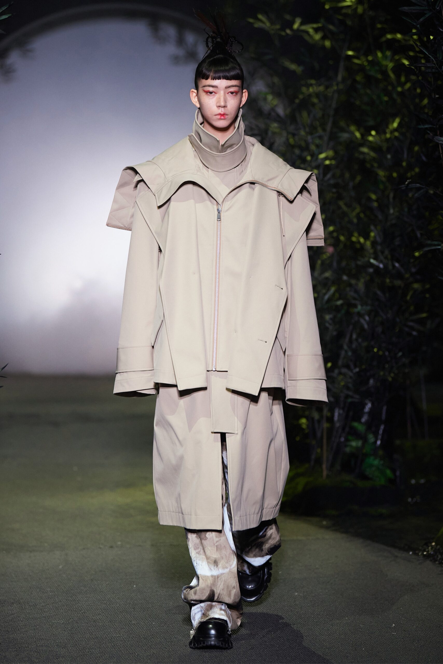 beige oversized coat and relaxed pants