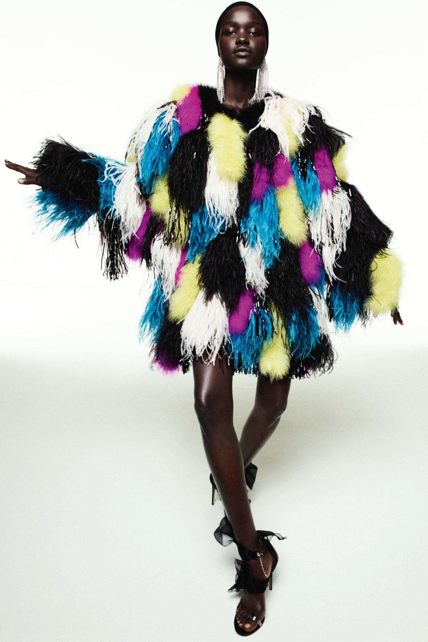 oversized fur coat with fringe