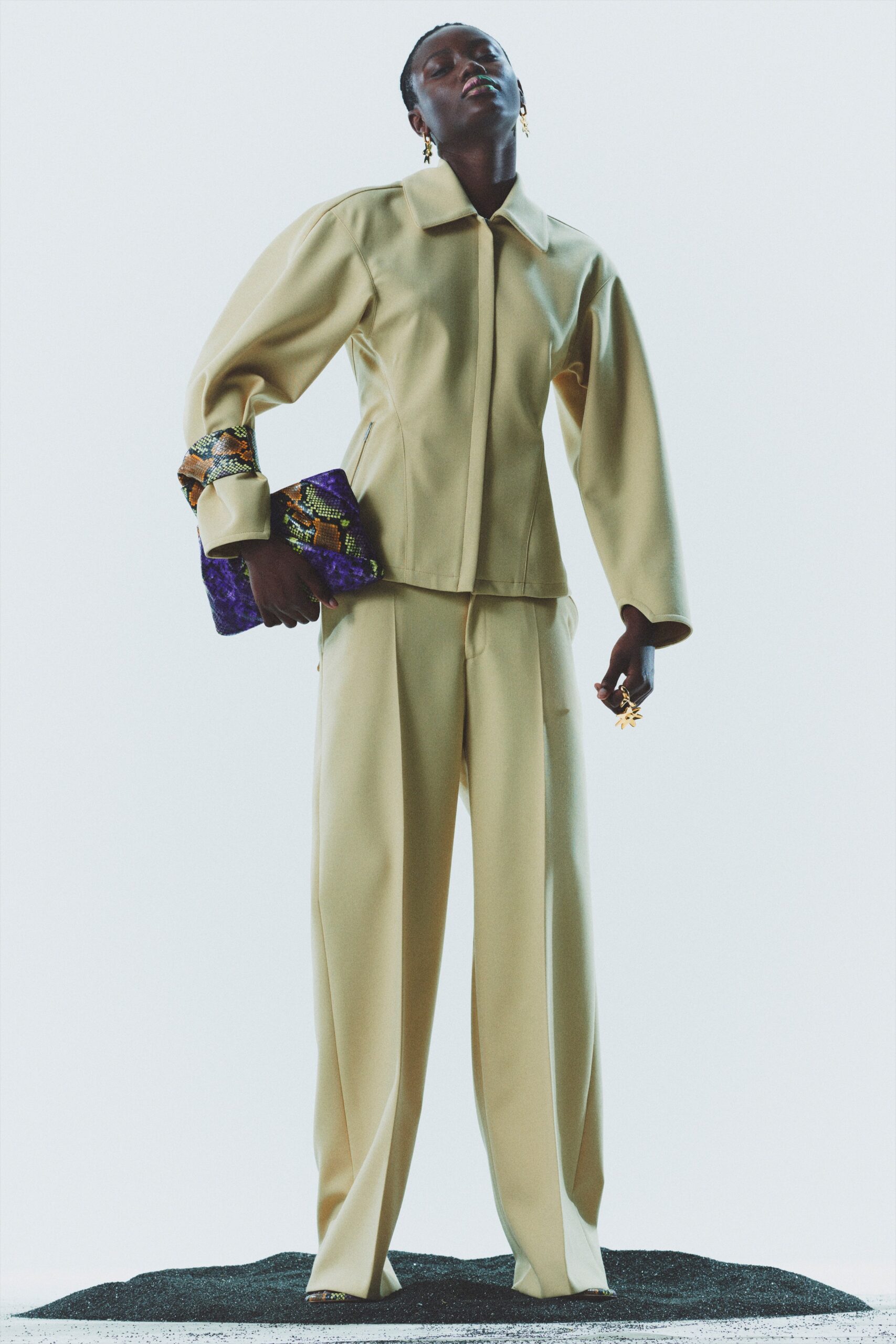 beige fitted jacket and tailored pants