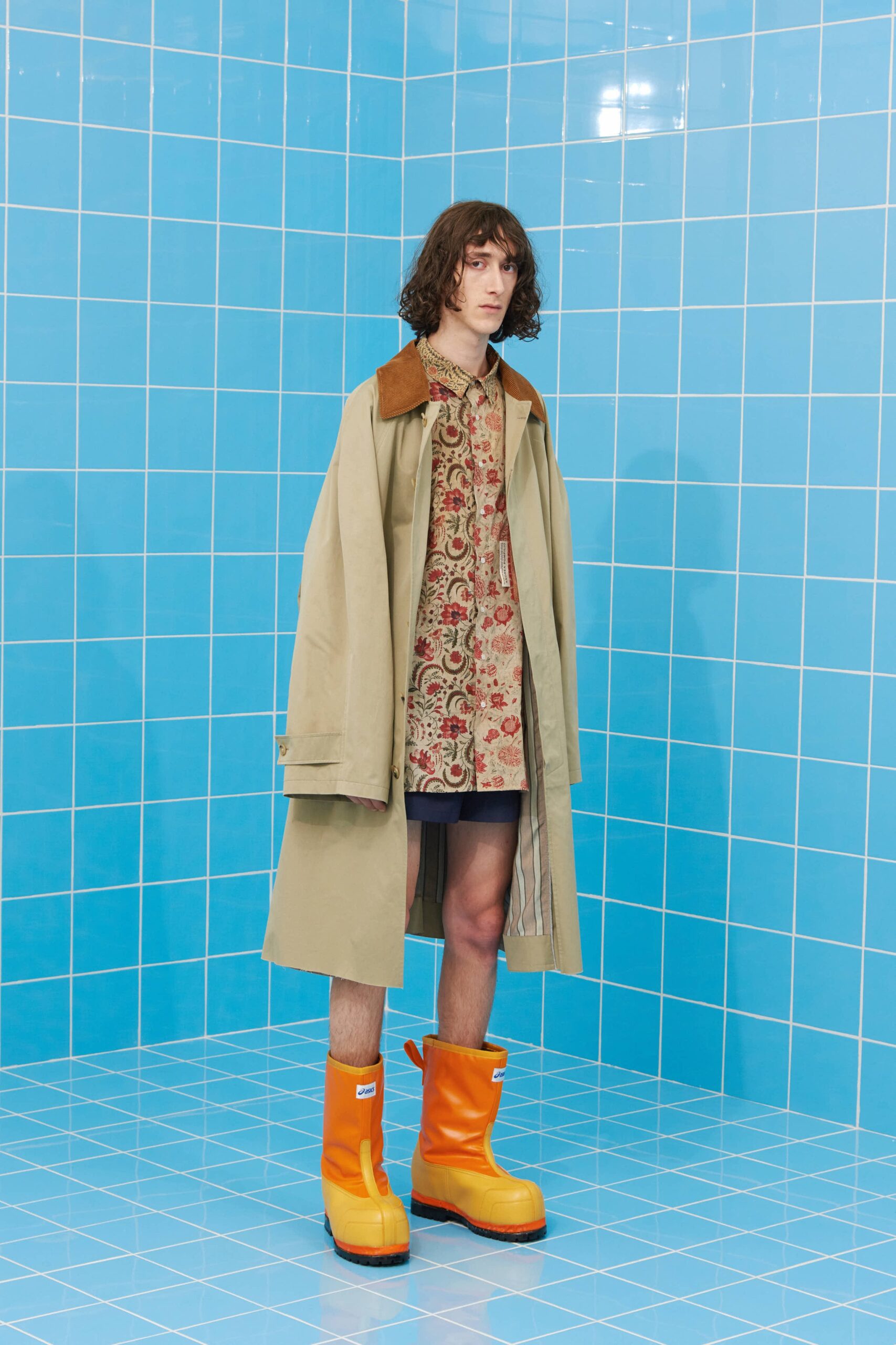 beige coat with printed shirt