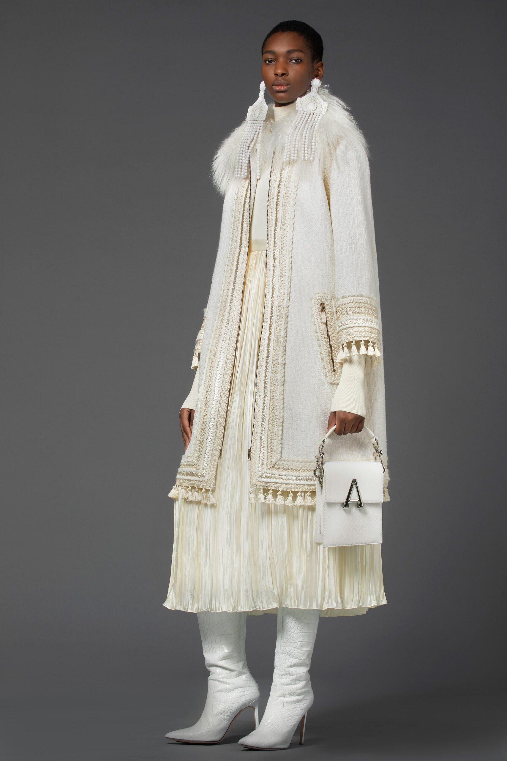 white wool coat with ivory dress