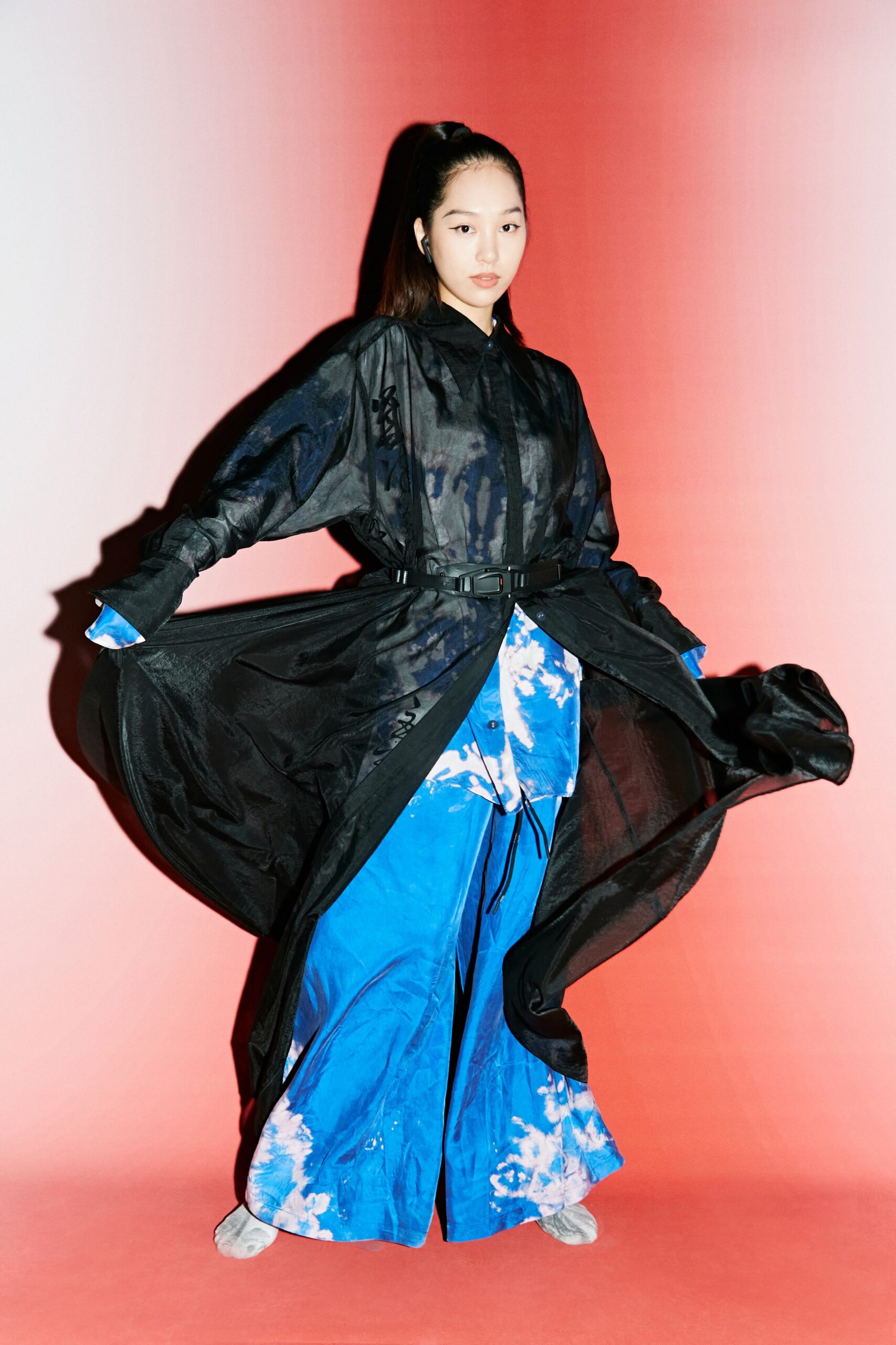 black silk coat and blue pants