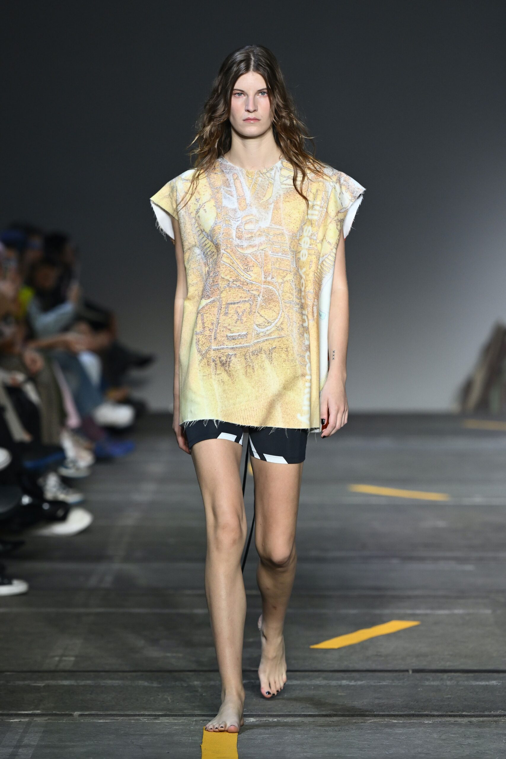 relaxed yellow printed top with black shorts