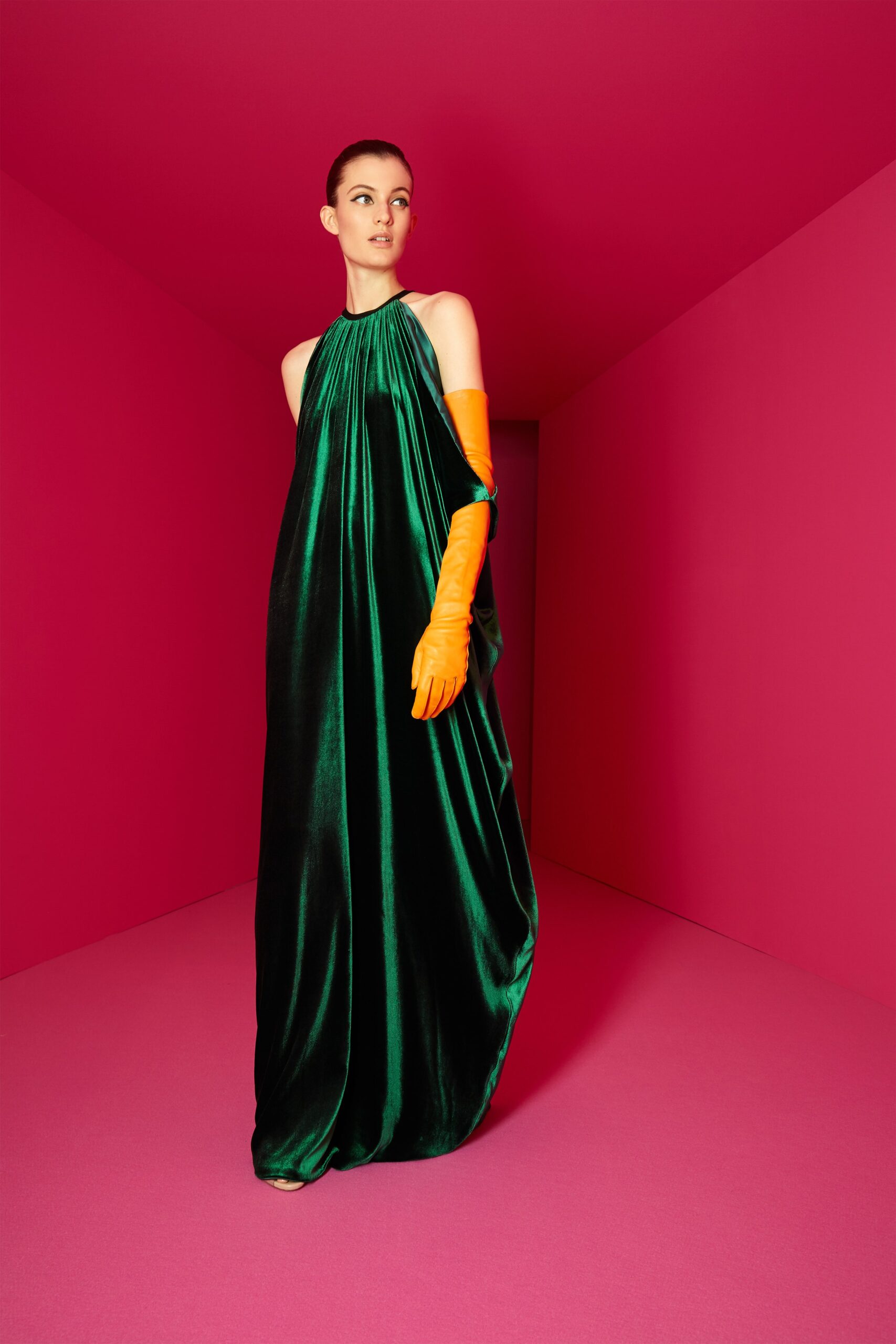 green velvet gown with orange gloves