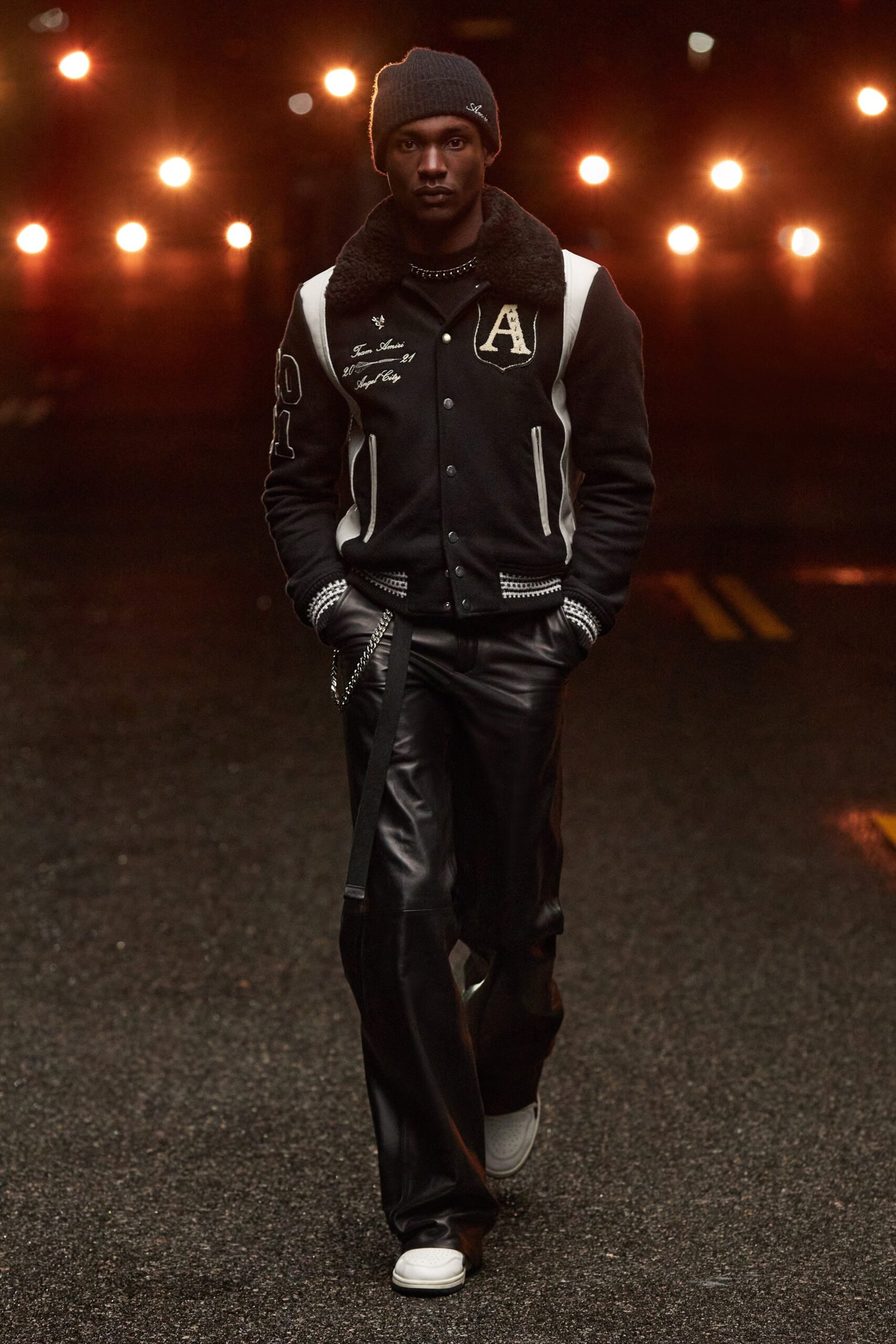 black wool jacket and leather pants
