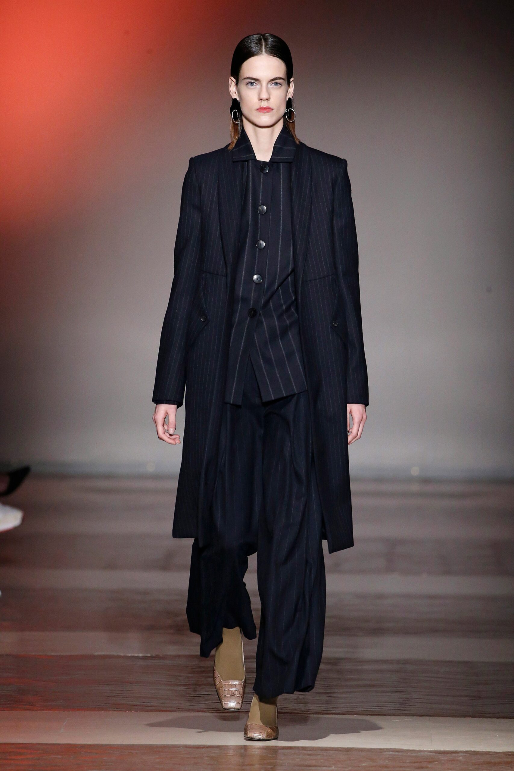 black tailored coat with wide-leg pants