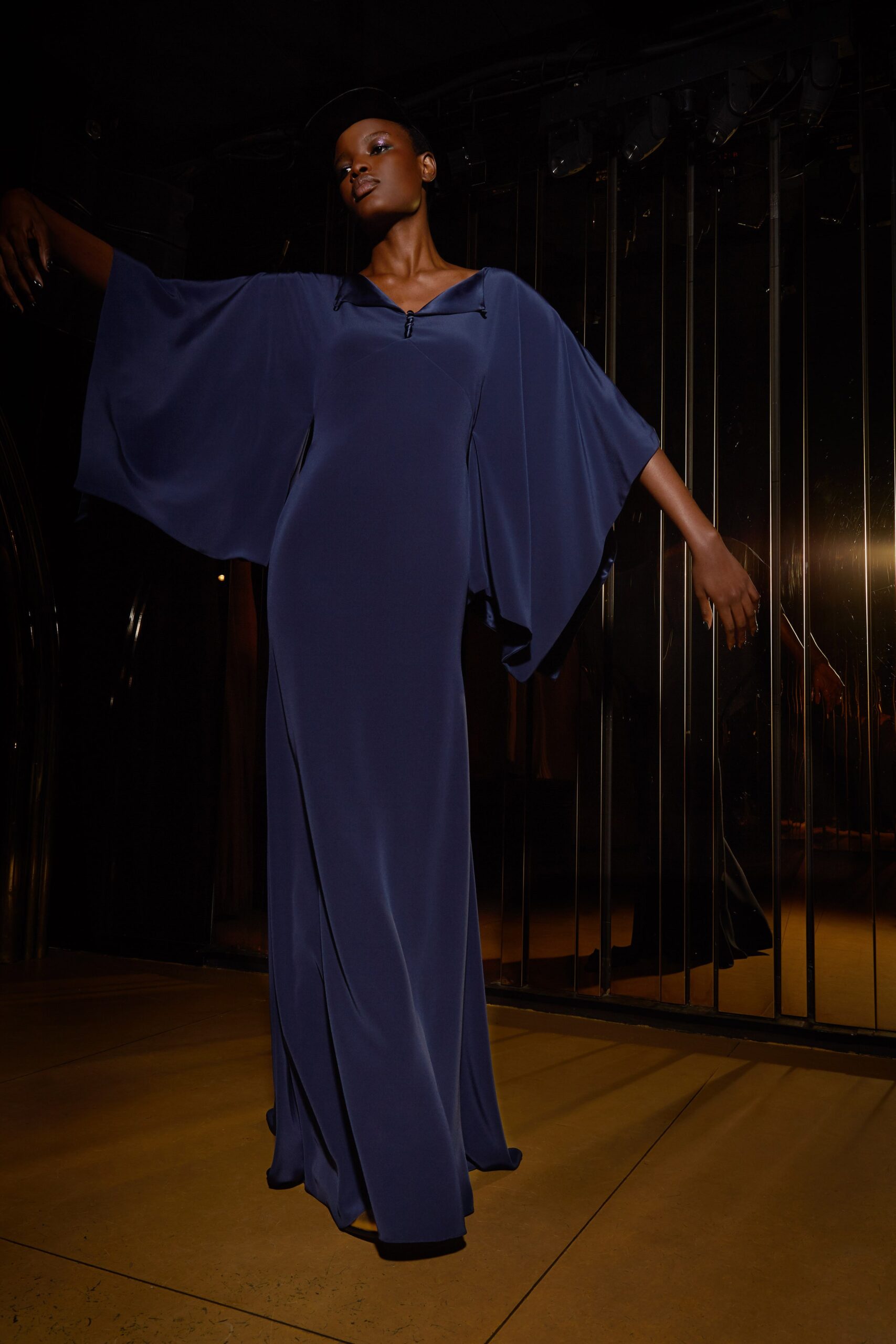 blue silk draped gown