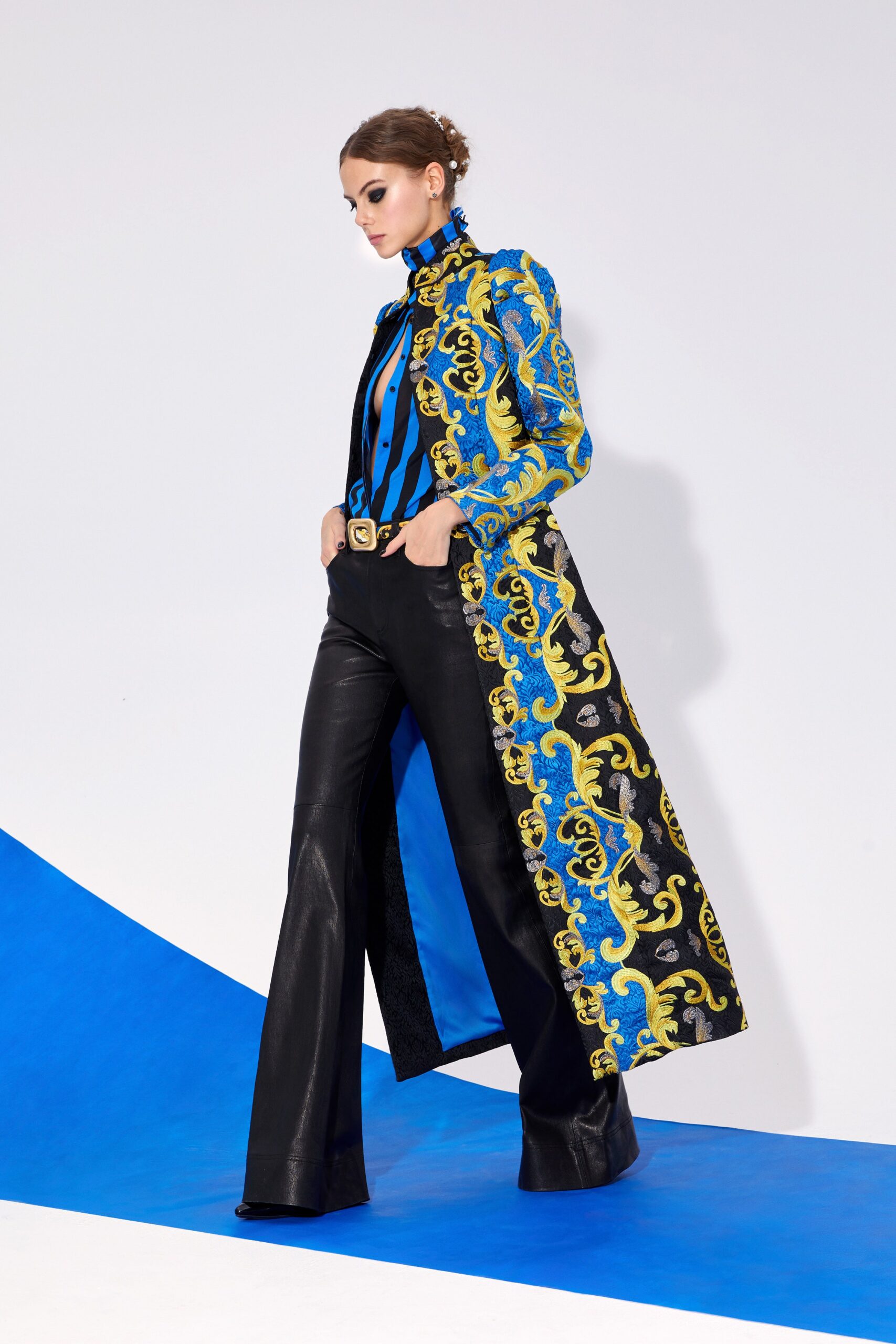 blue embroidered coat with flared pants