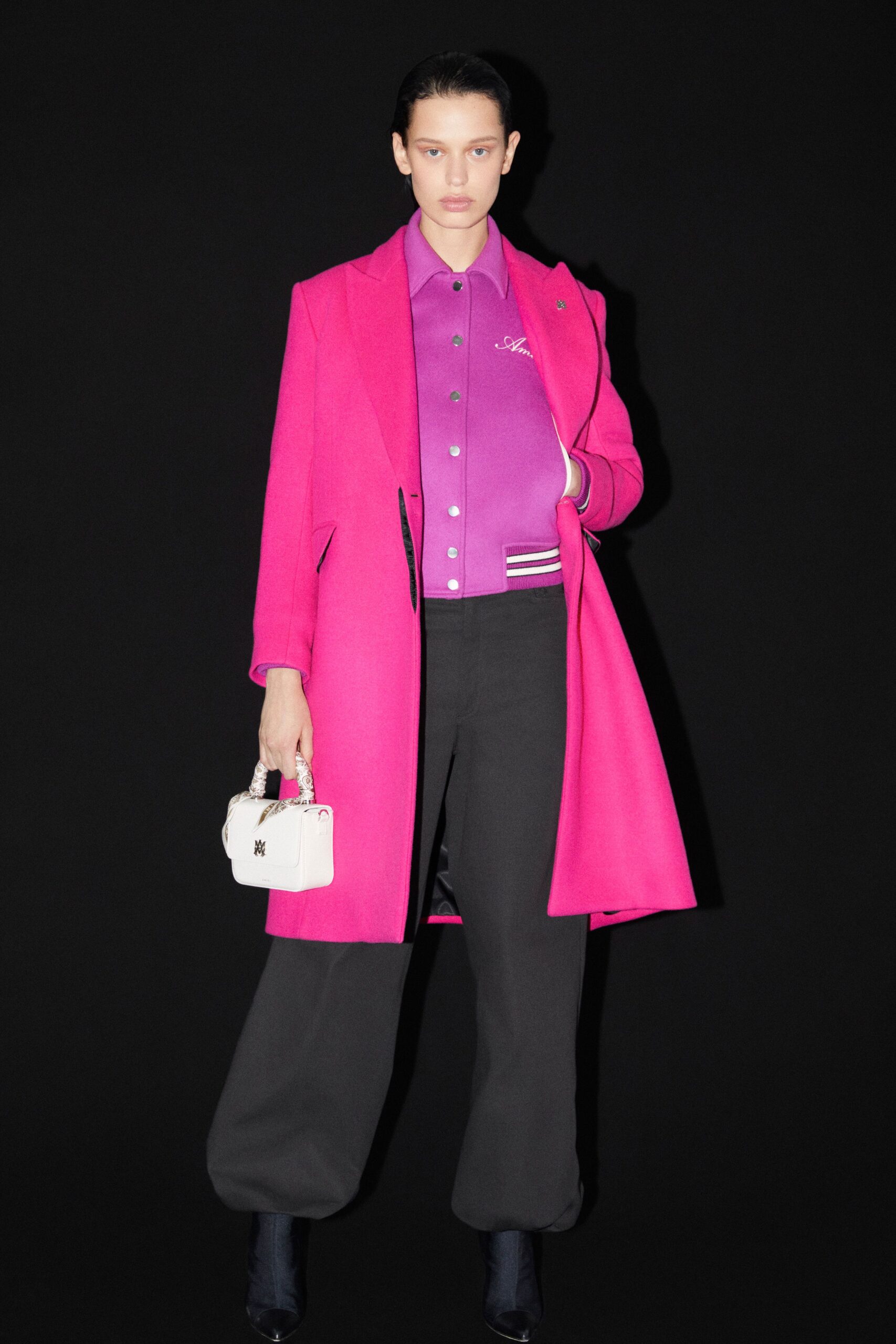 pink tailored coat with purple shirt