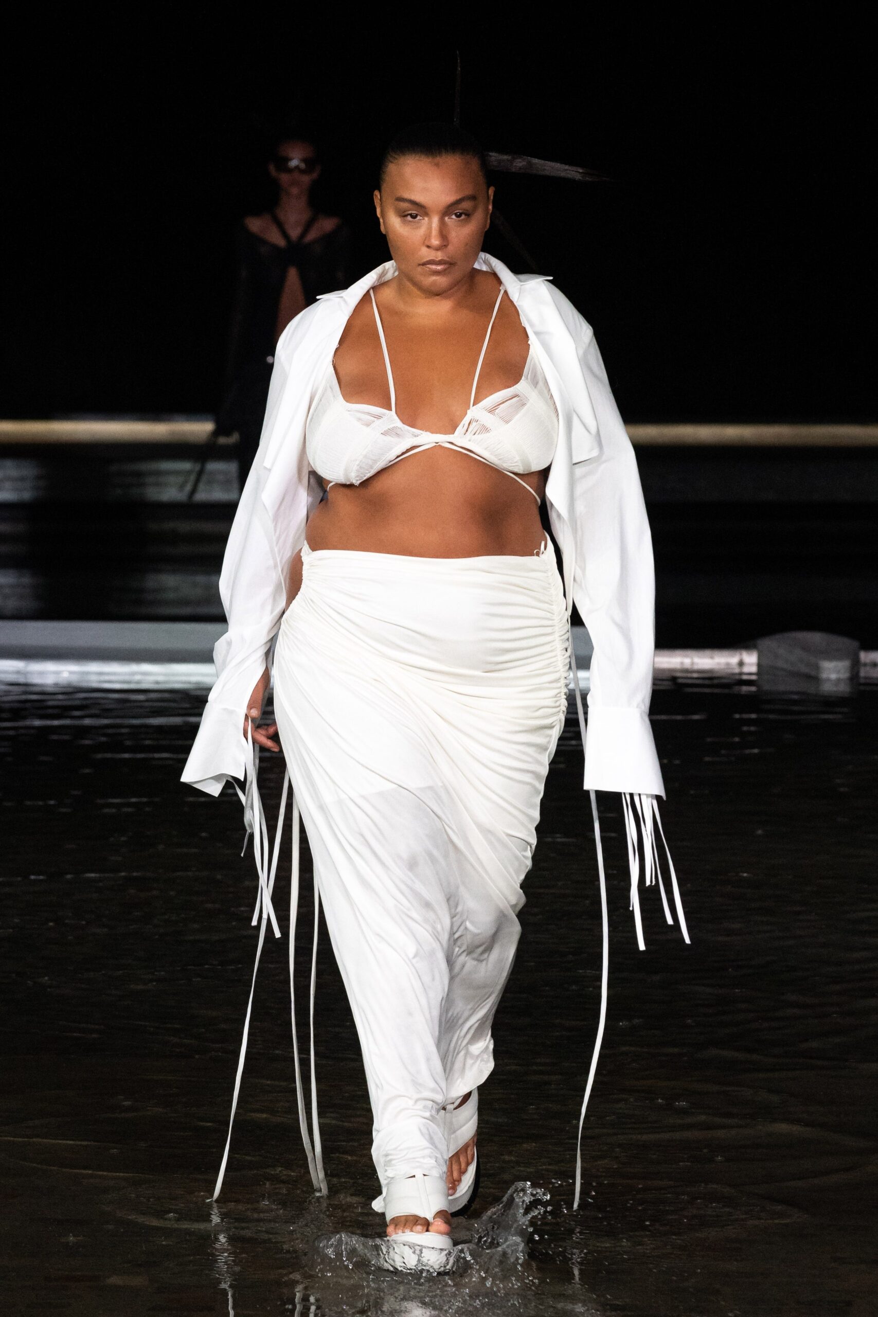 white fitted top and skirt with oversized jacket