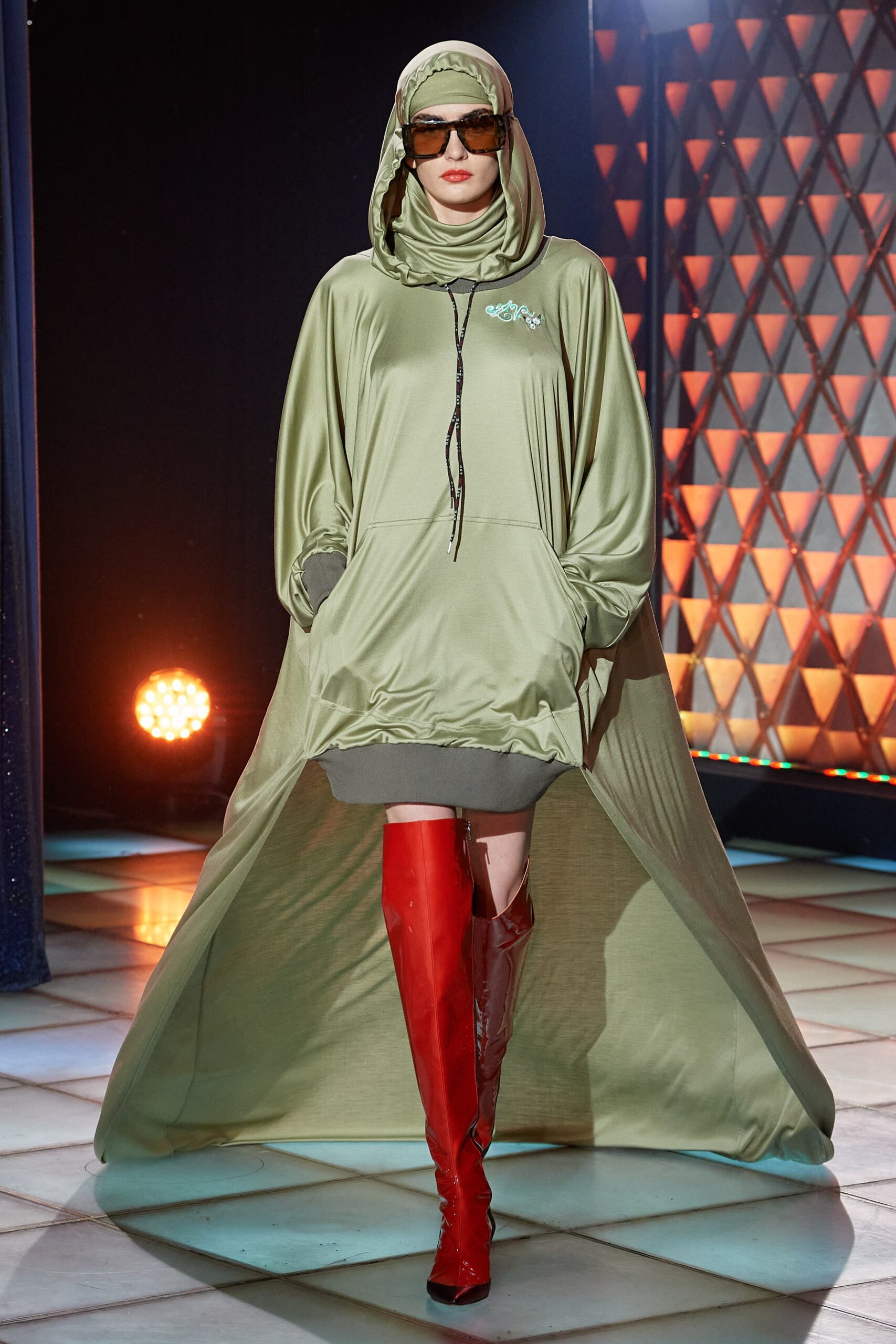 green hooded midi dress with red boots