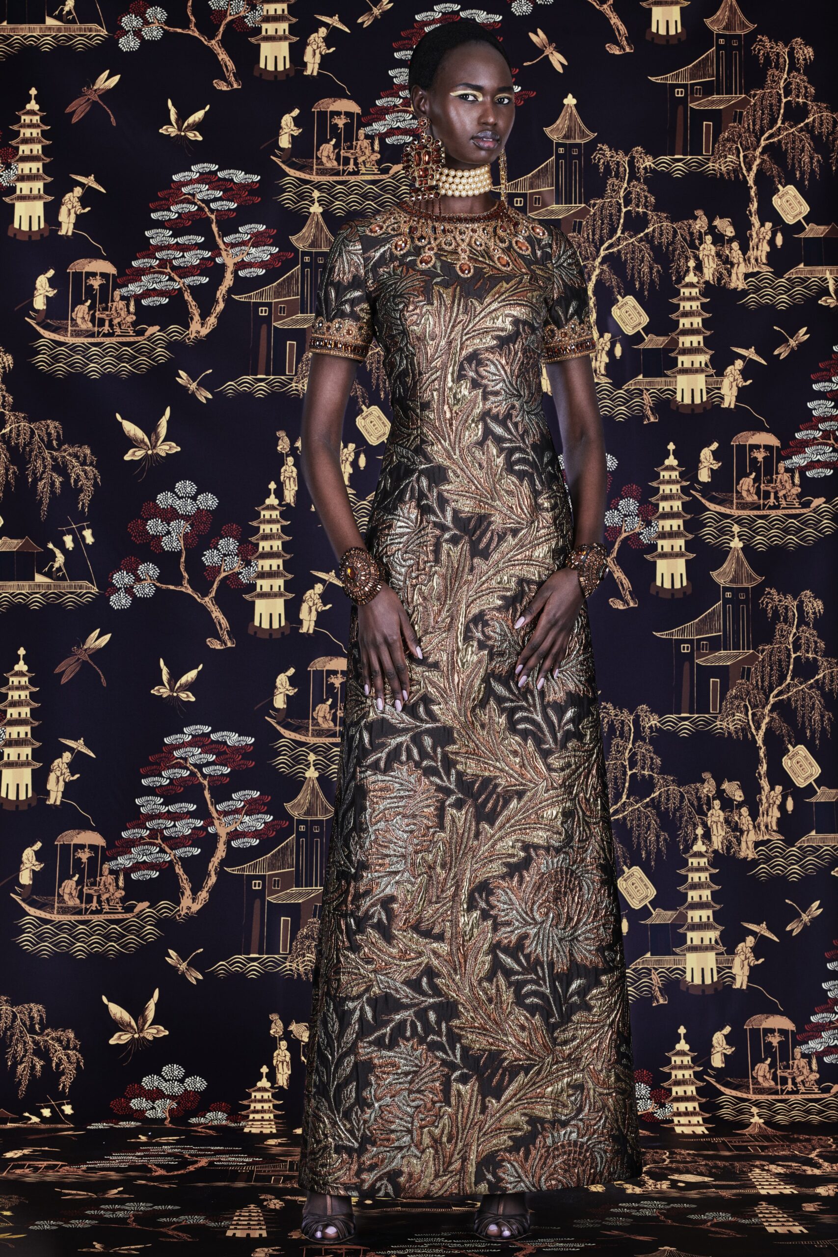 black and gold embroidered gown