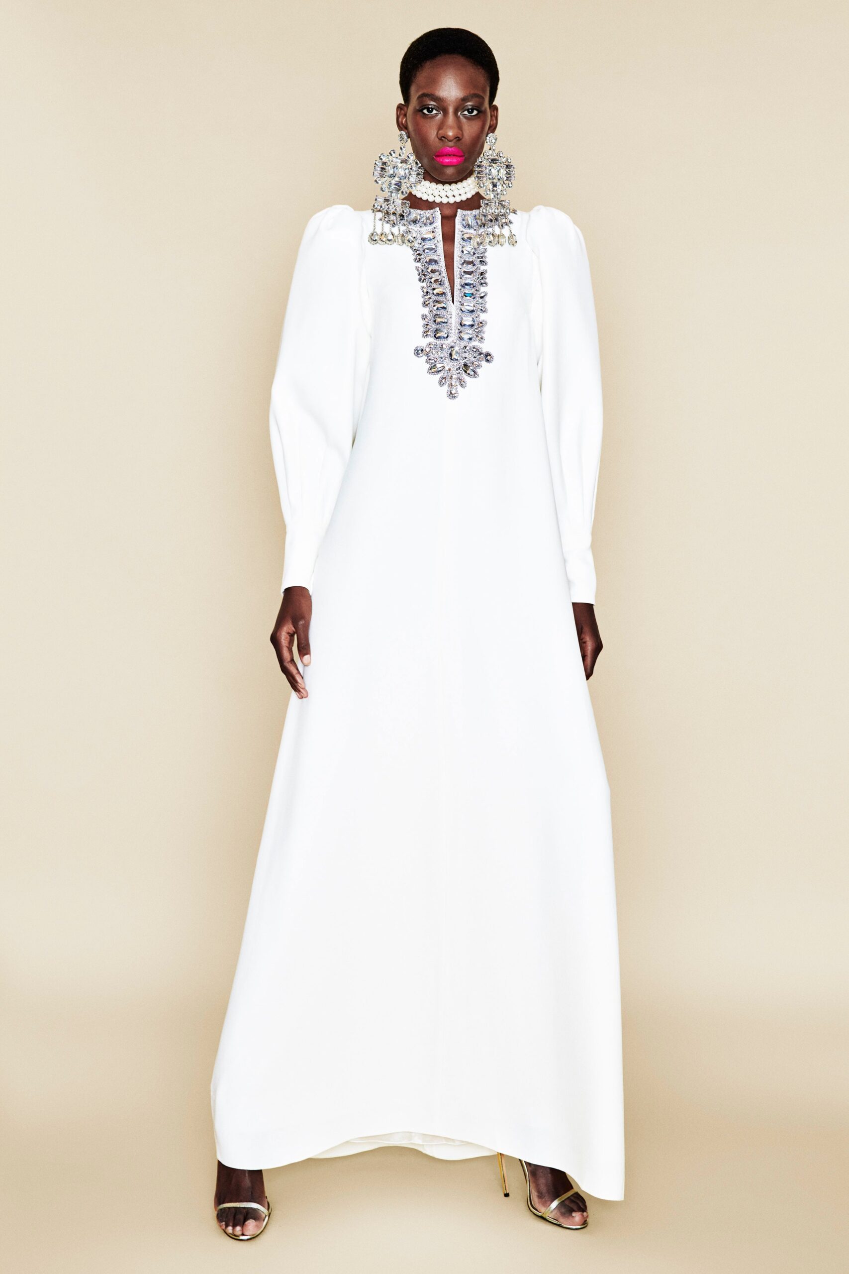 white silk embellished gown