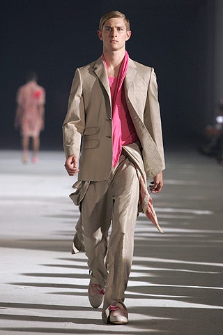 beige tailored suit with pink t-shirt
