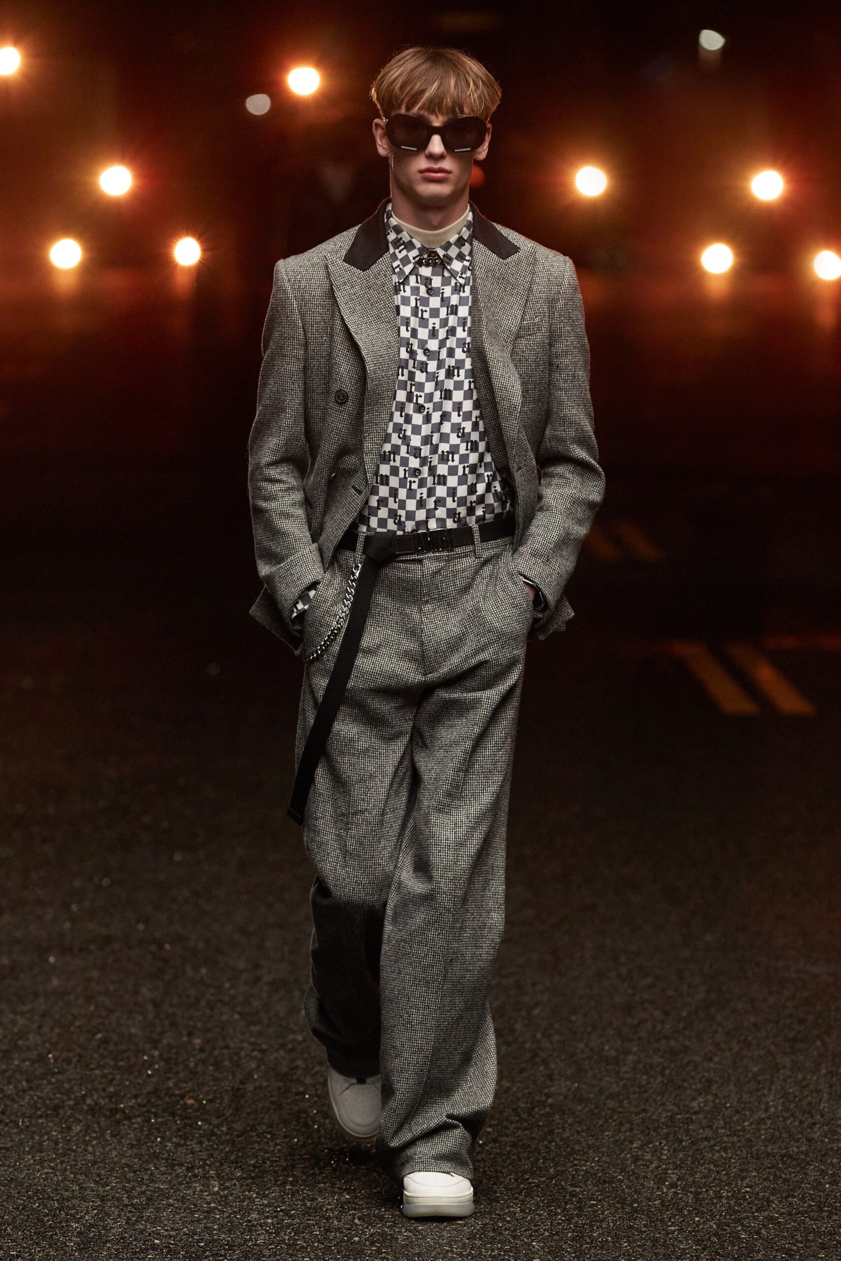 gray tailored suit with checked shirt