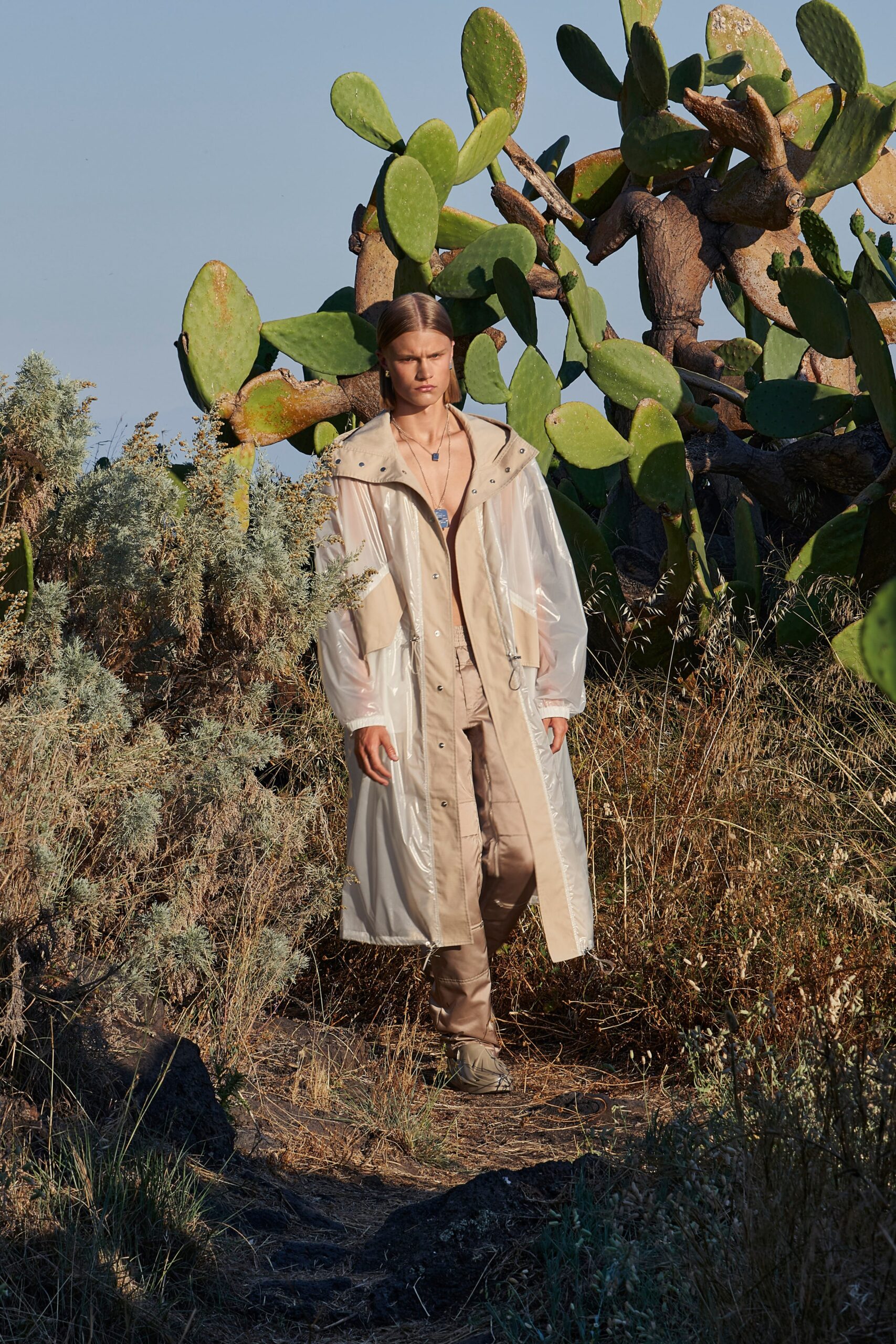 beige vinyl long-sleeve collared relaxed zippered sheer coat