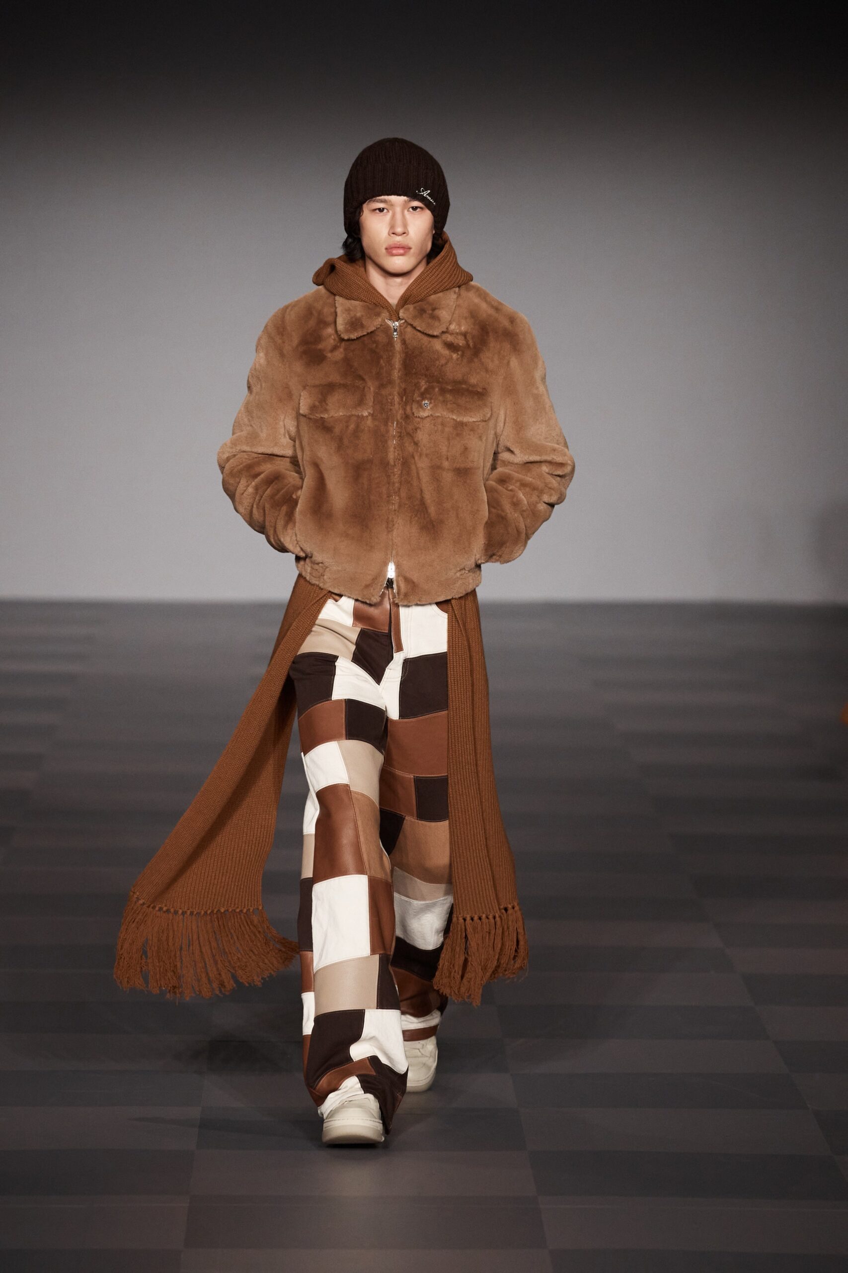 brown faux-fur jacket and flared pants