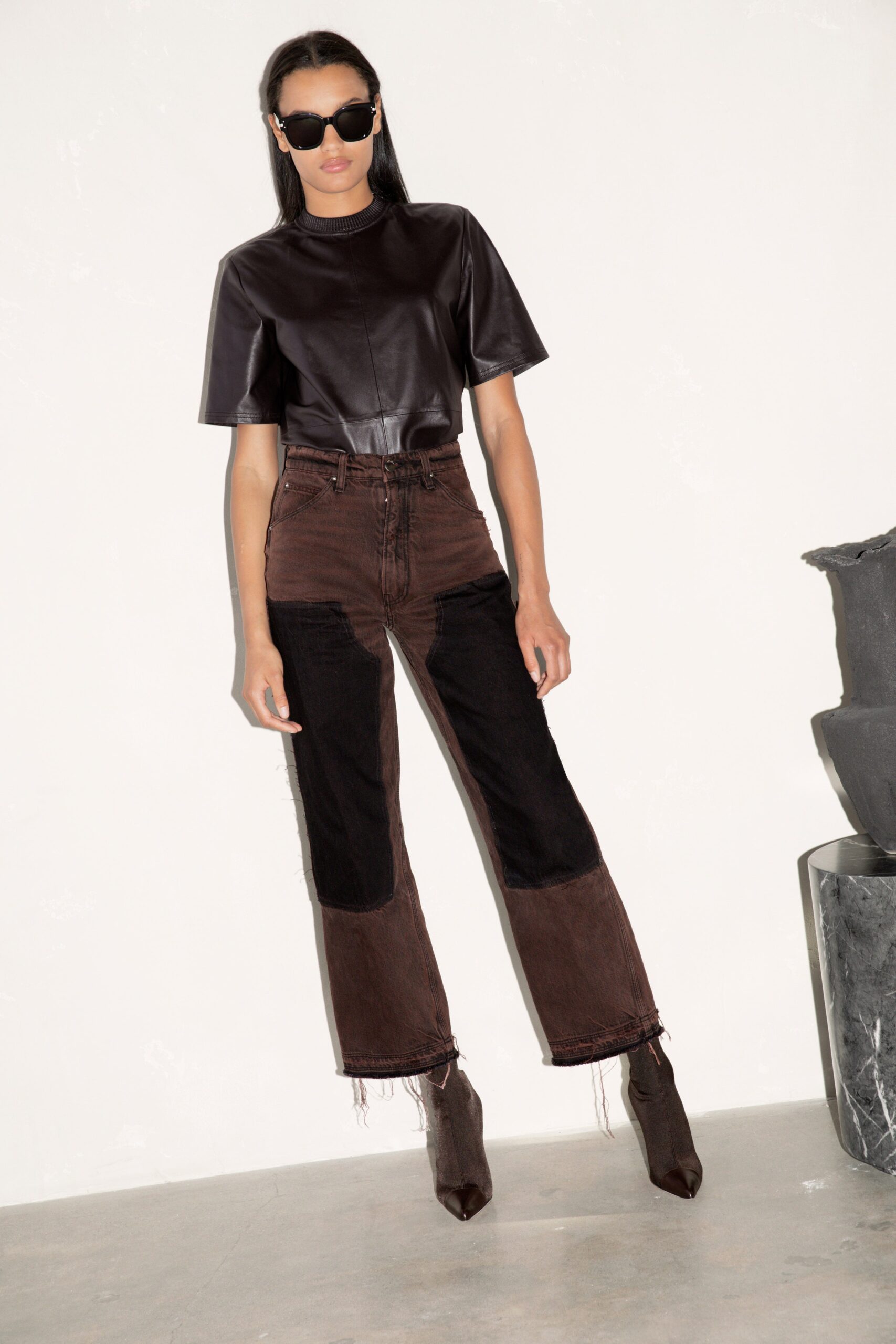 black leather fitted top with patchwork pants