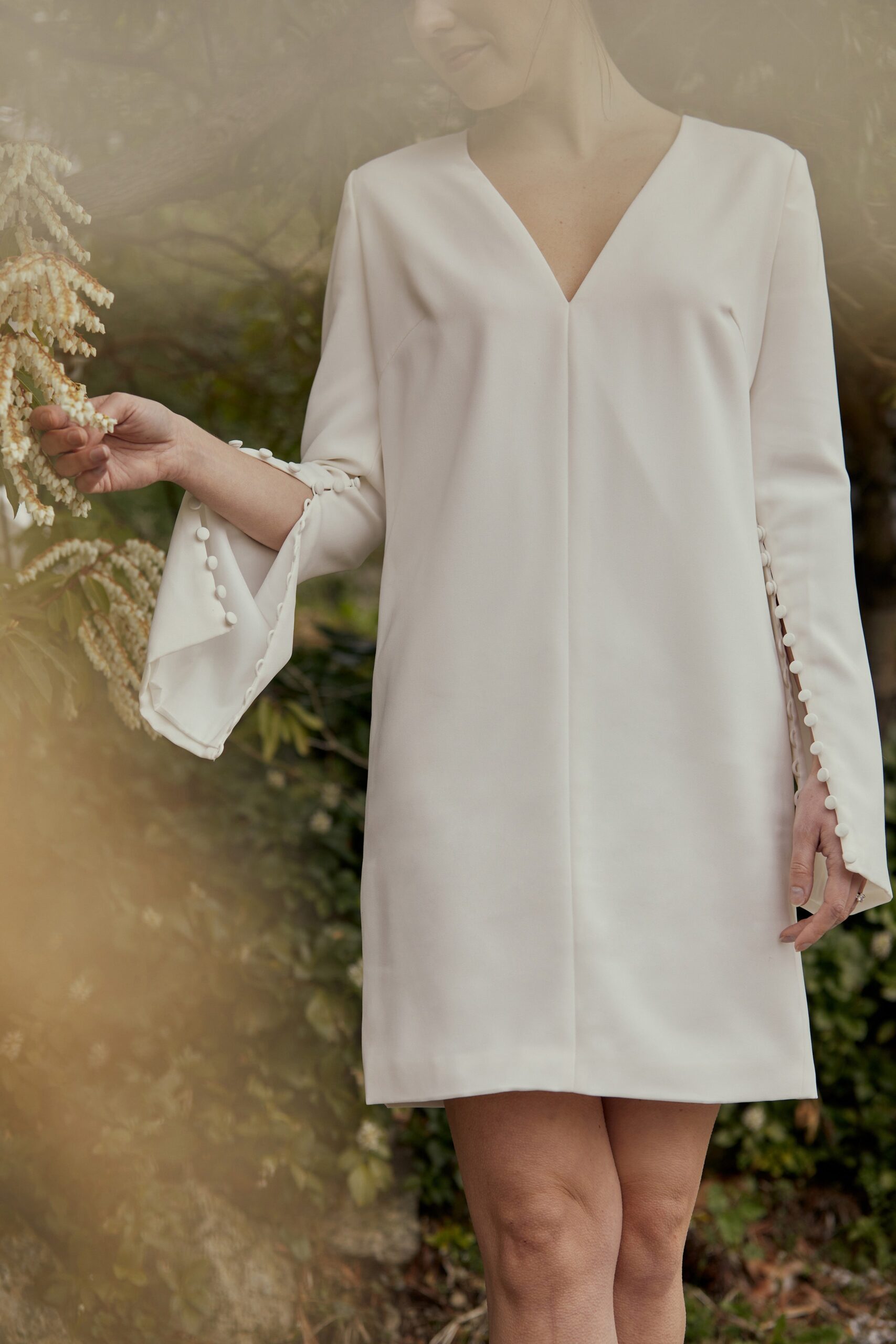 white silk long-sleeve mini dress