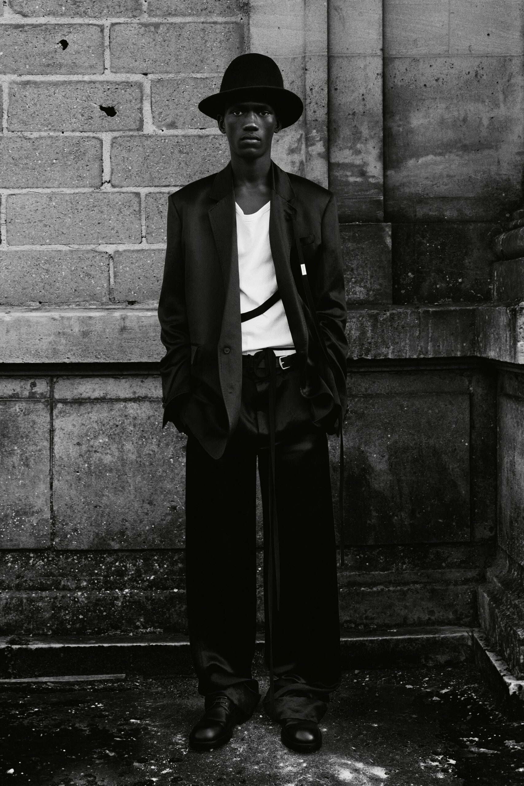 black suit with white t-shirt