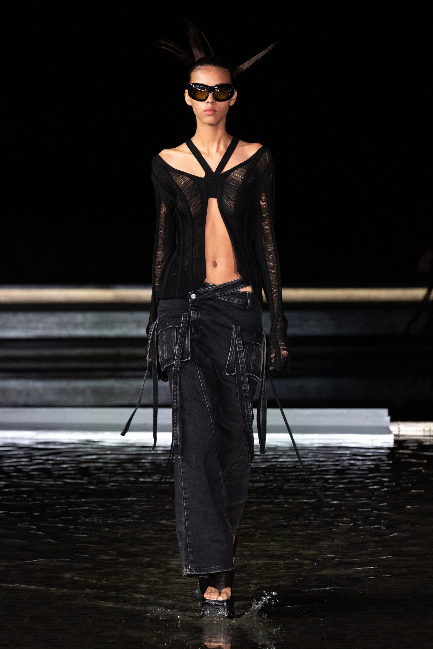 black mesh top and denim pants