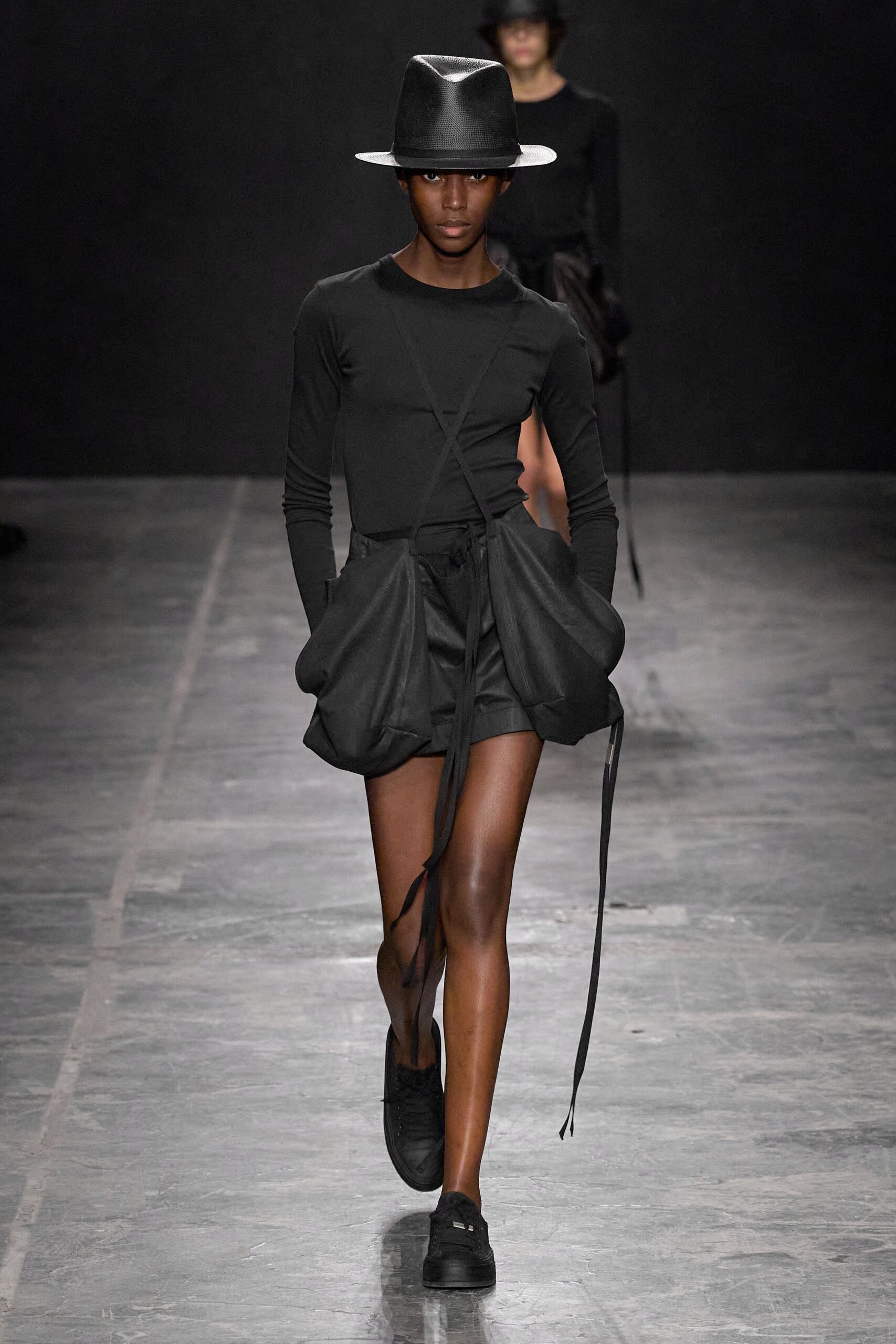 black fitted top with relaxed shorts