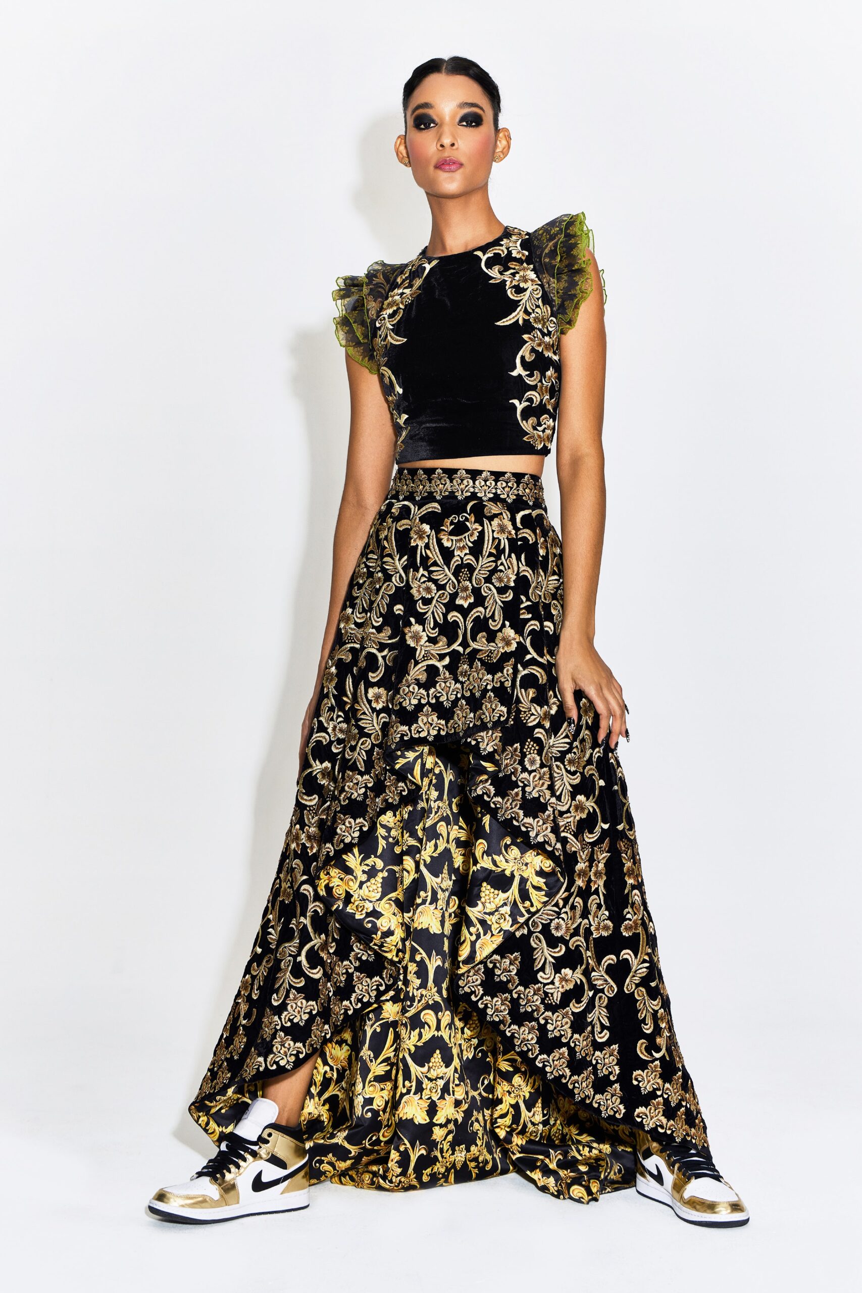 black velvet sleeveless high-neck fitted ruffled top