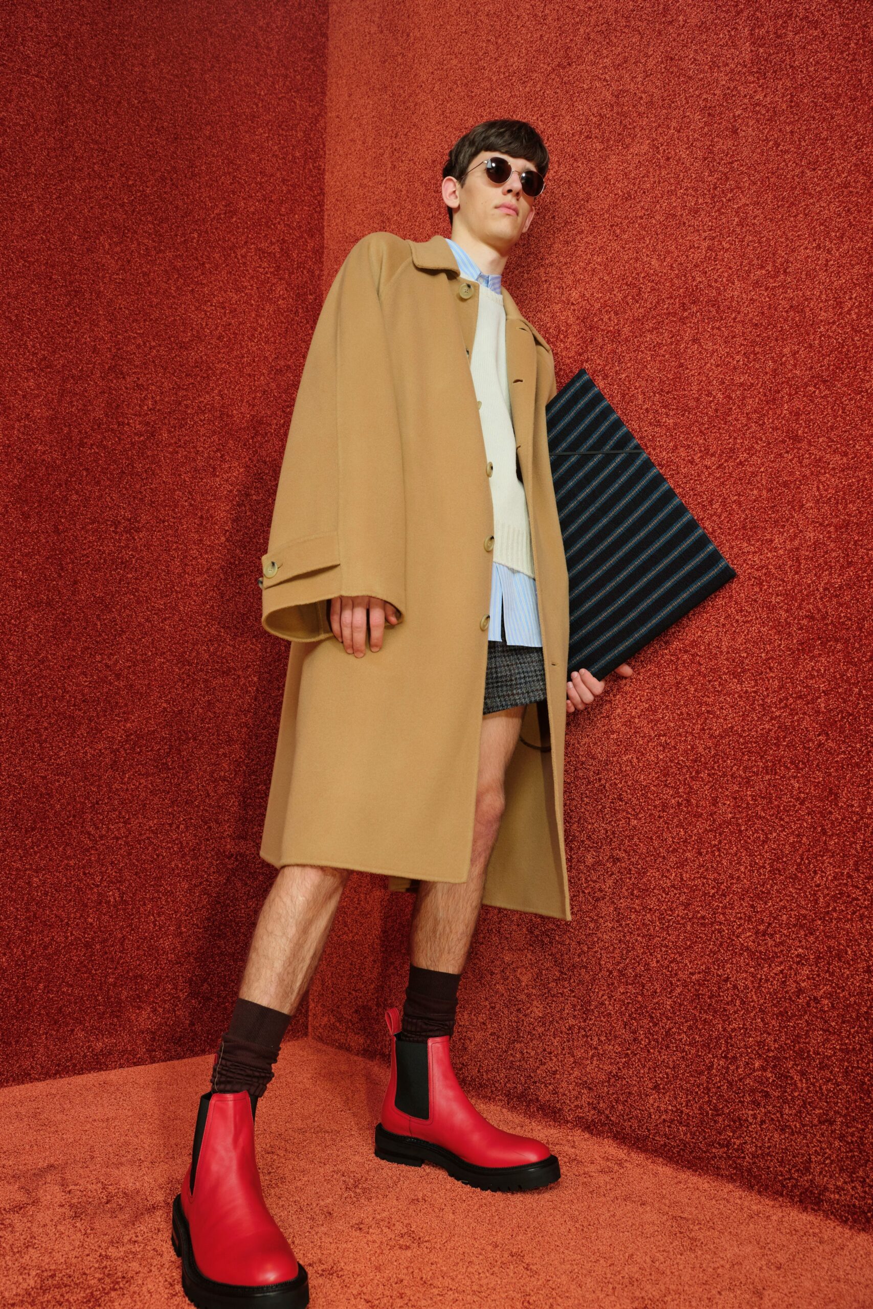 beige wool coat with blue shirt