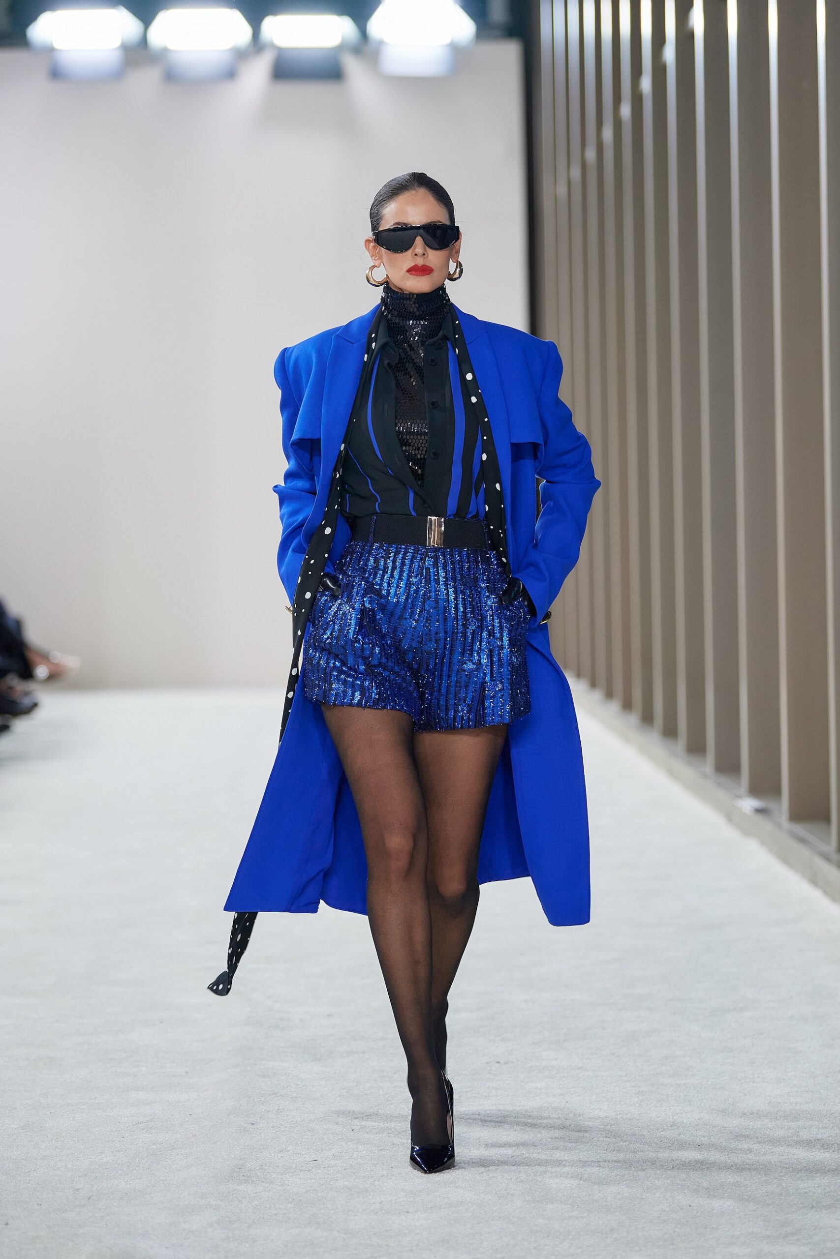 blue oversized coat with black blouse