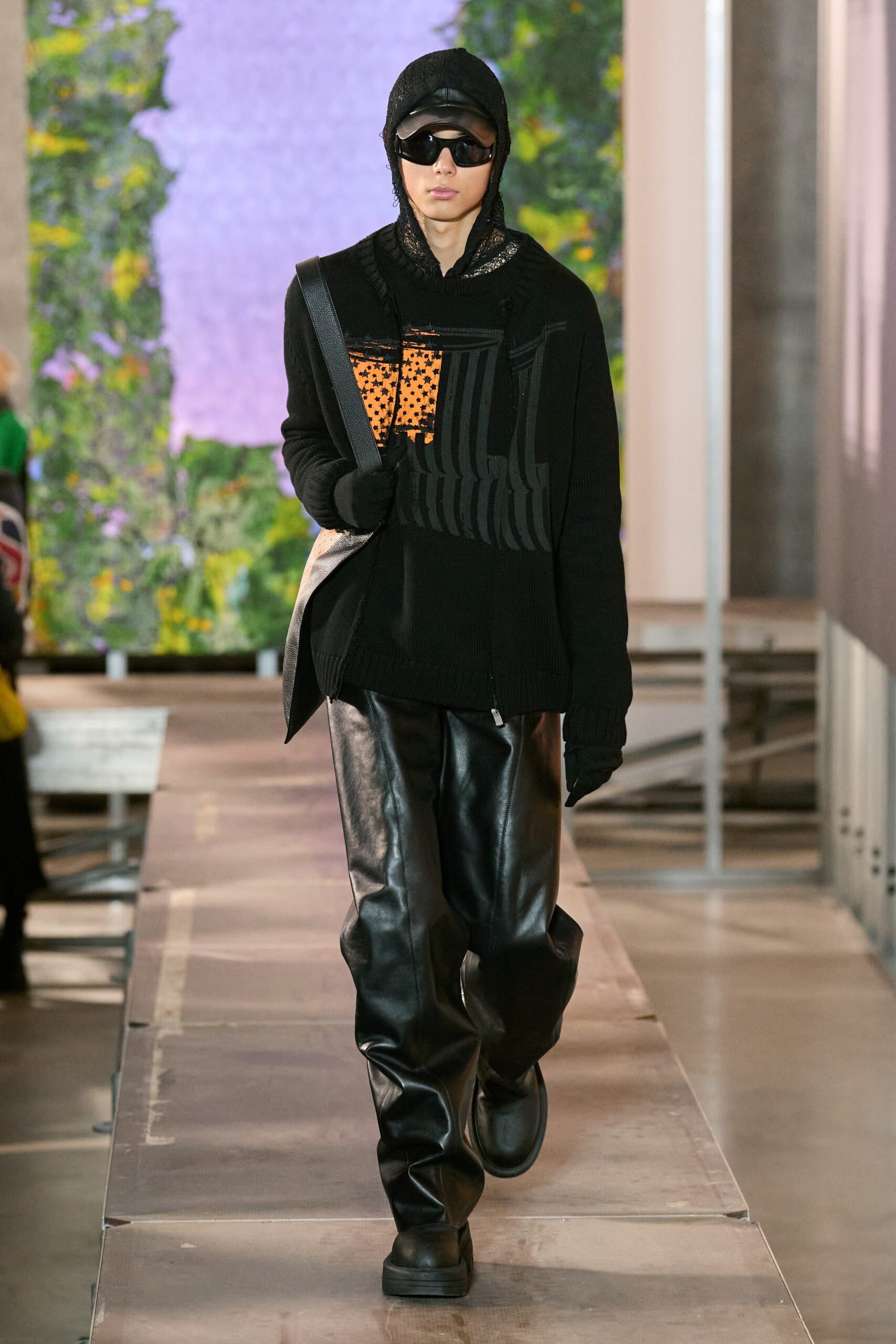 black knit top with leather pants