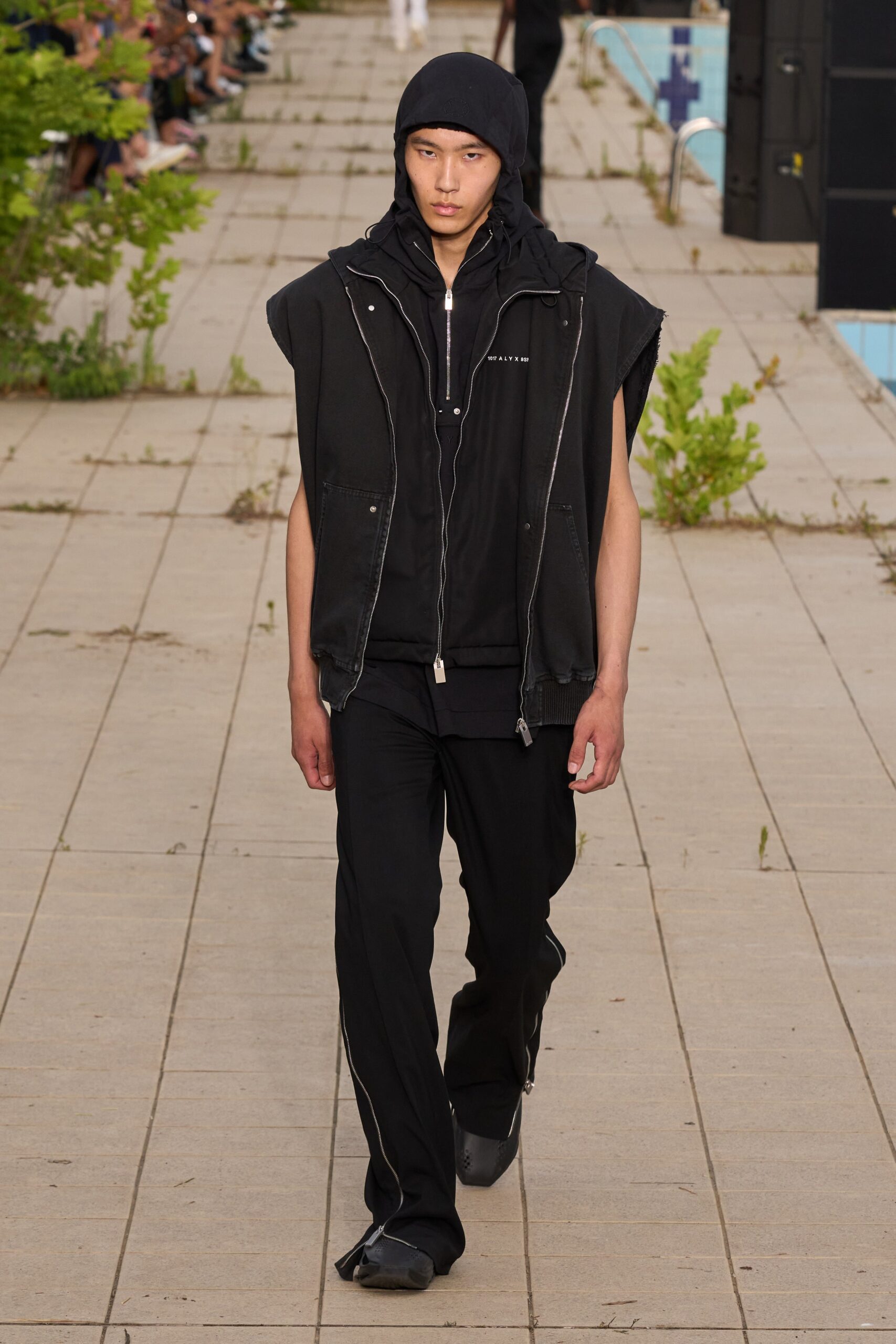 black relaxed vest and fitted jacket