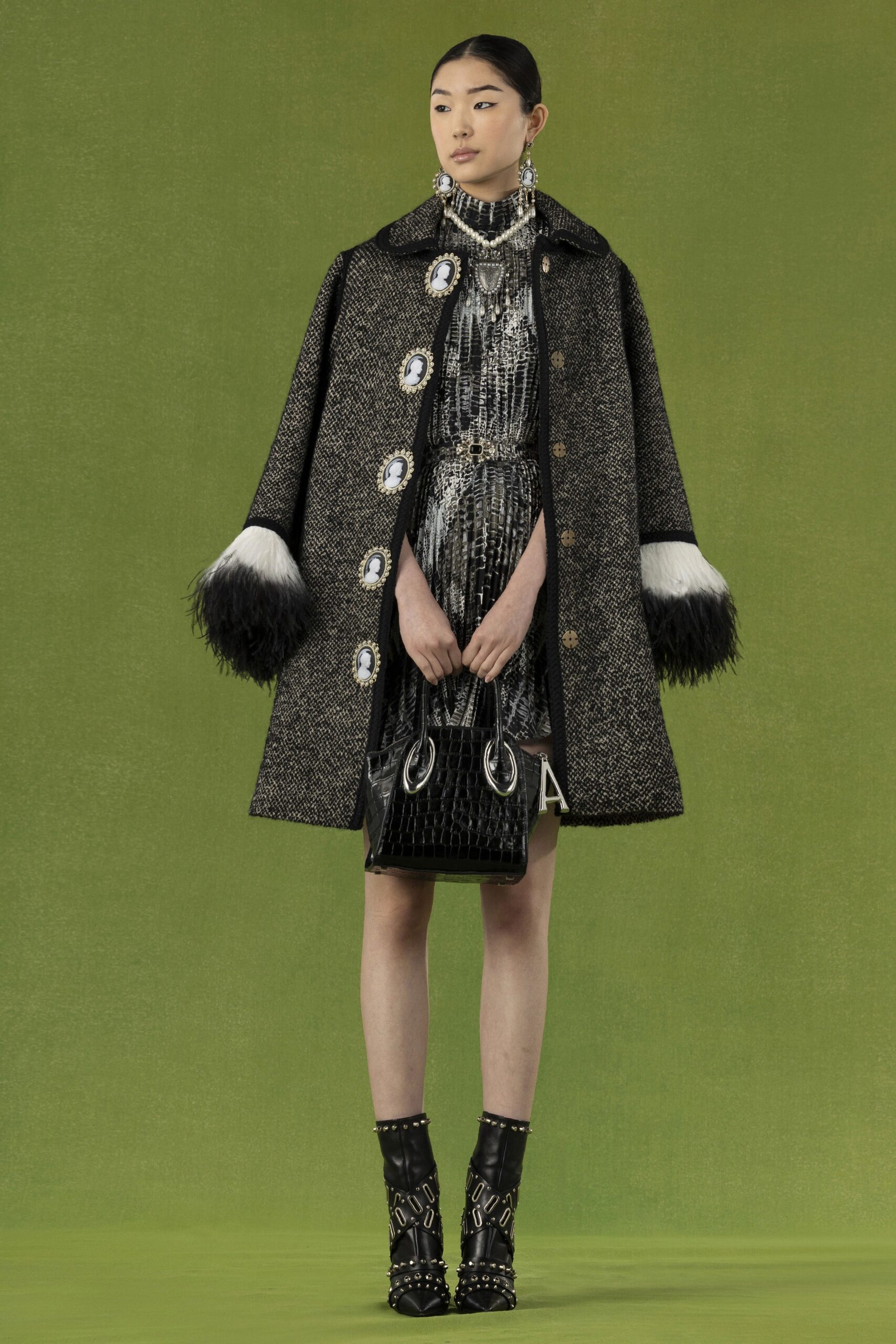black wool coat with pleated dress