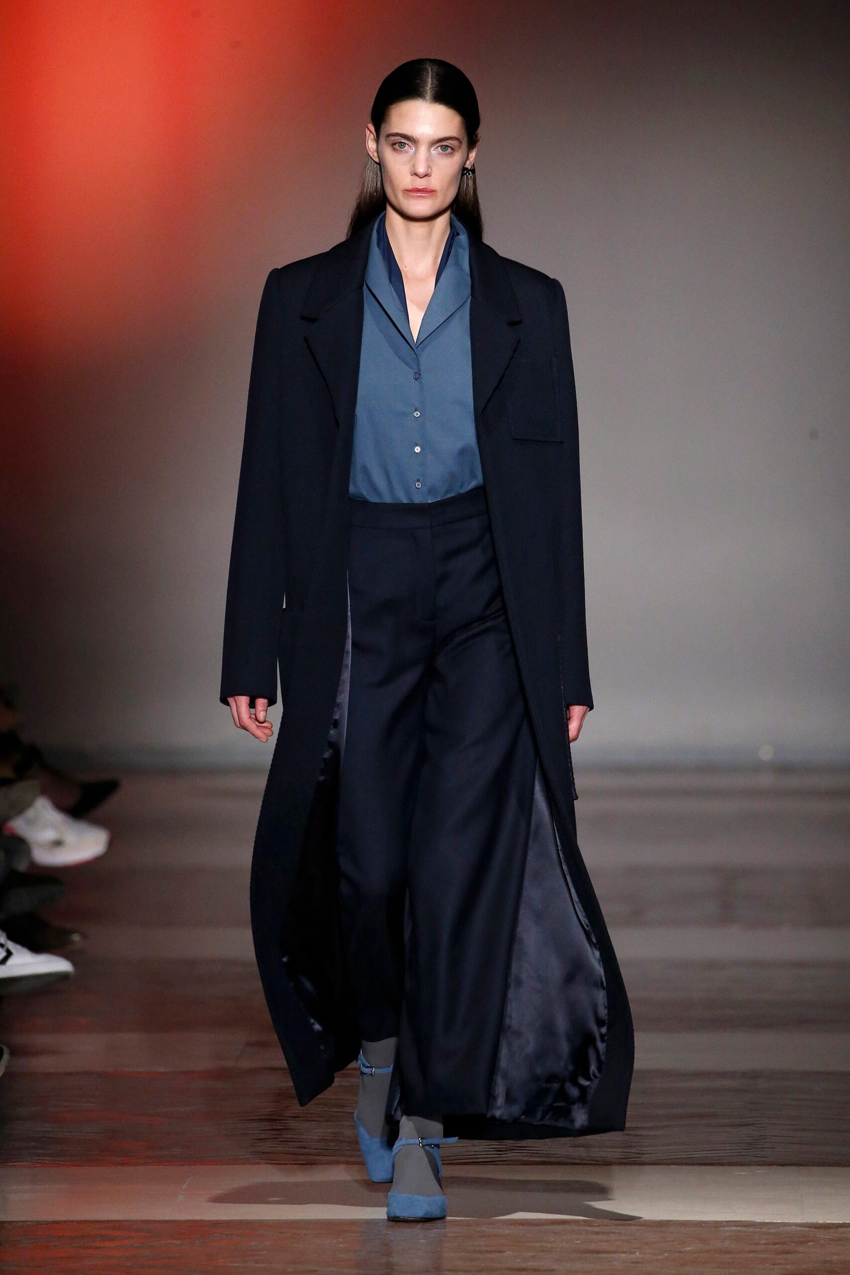 black wool coat with blue shirt