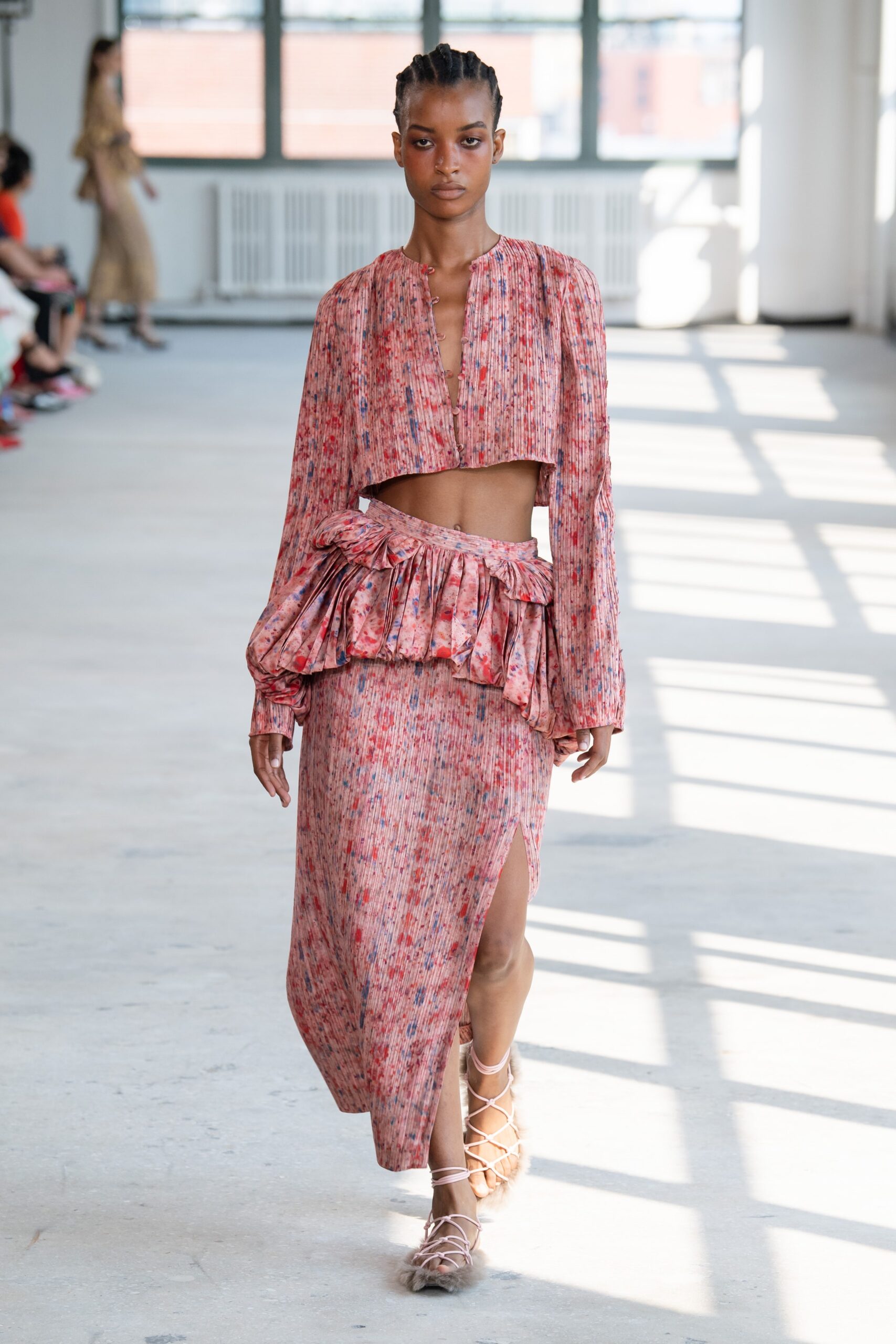 red pink ruffled top and skirt