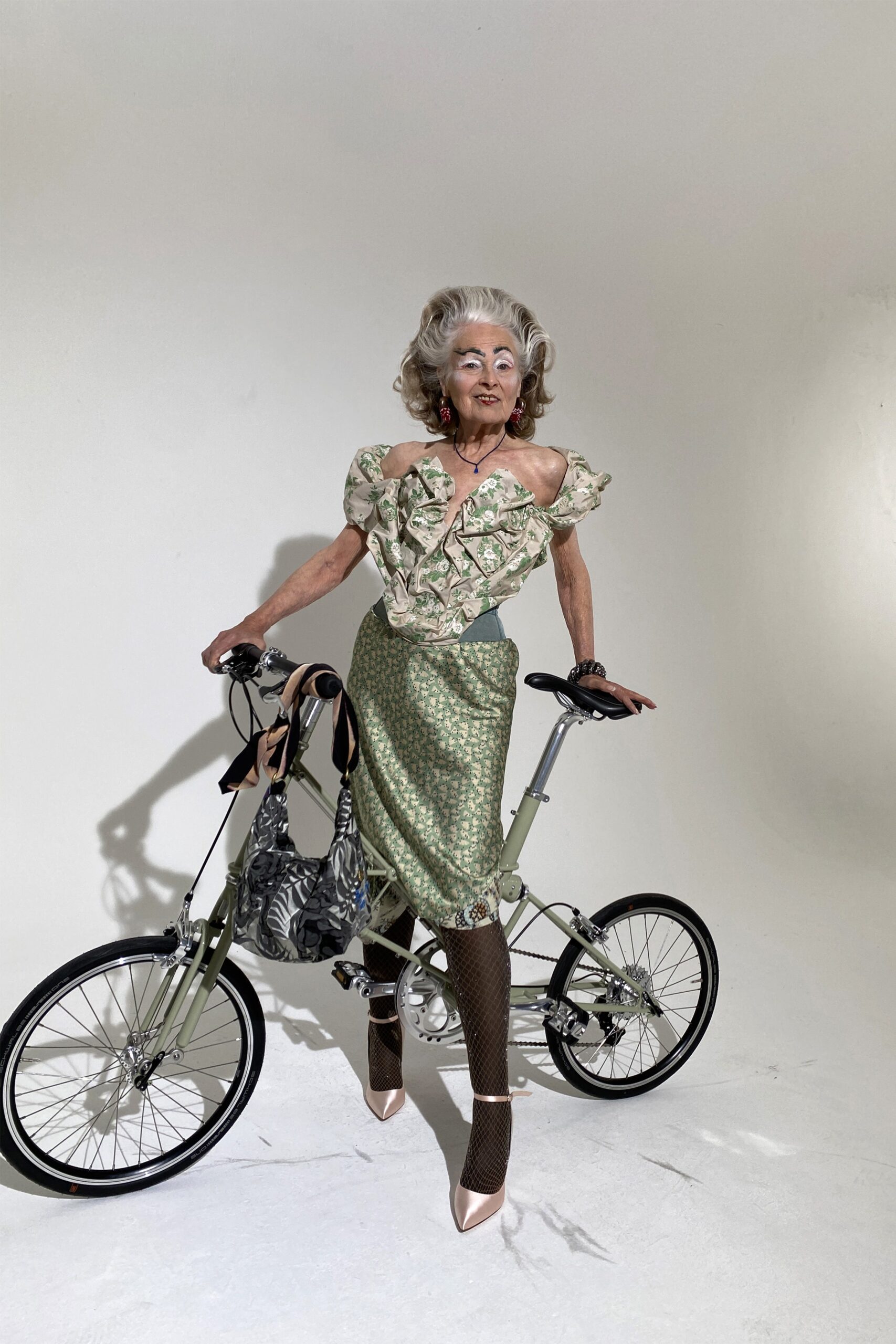 green ruffled top and pencil skirt