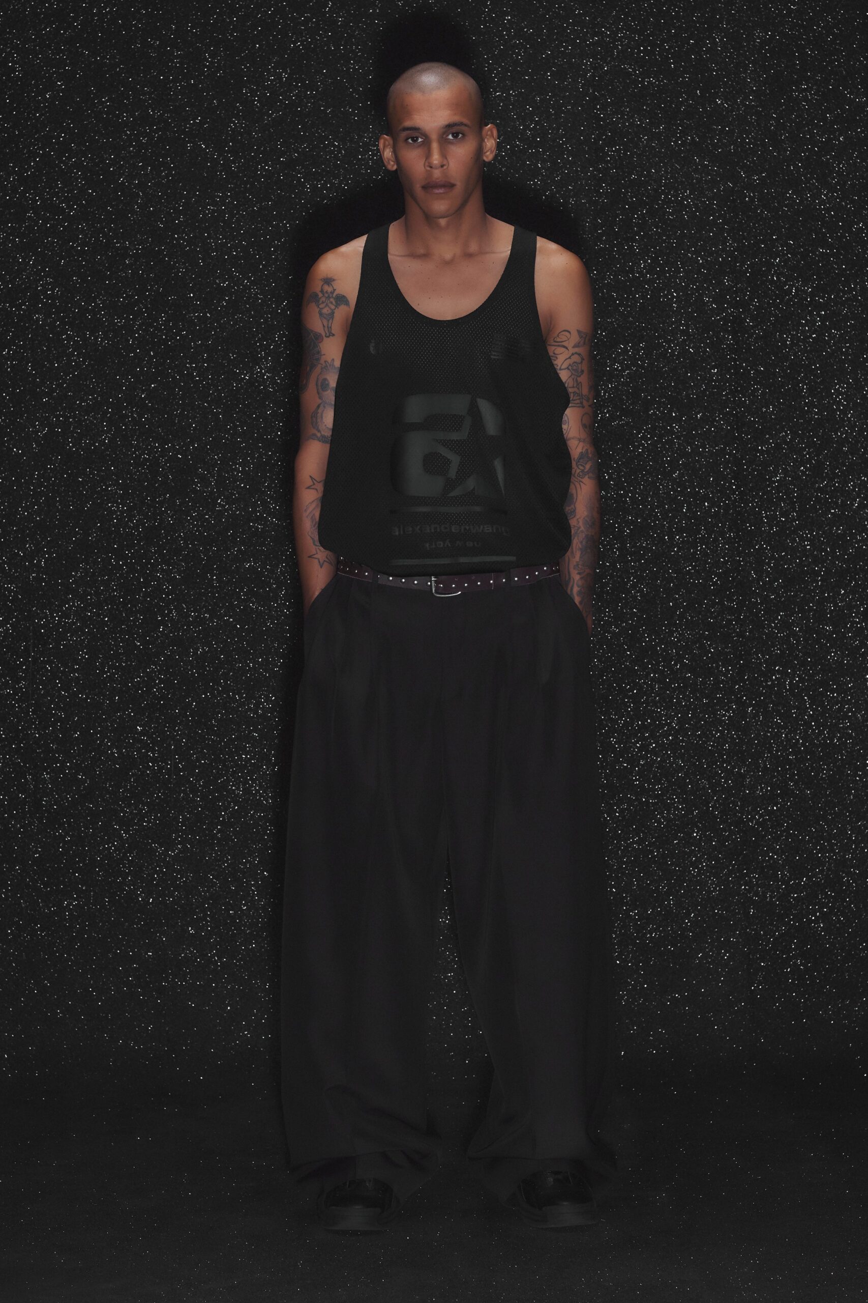 black tank-top and relaxed pants