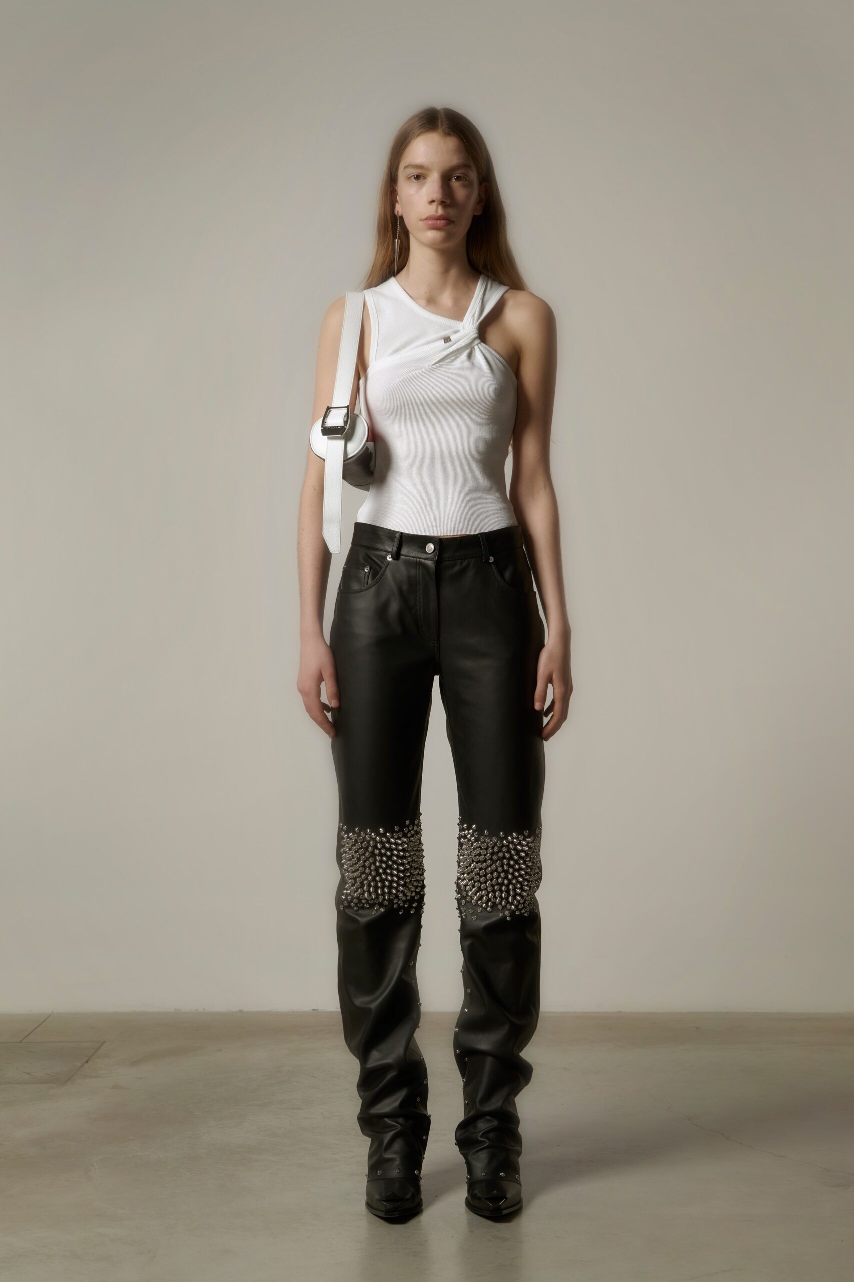 black leather fitted straight-leg zippered pants