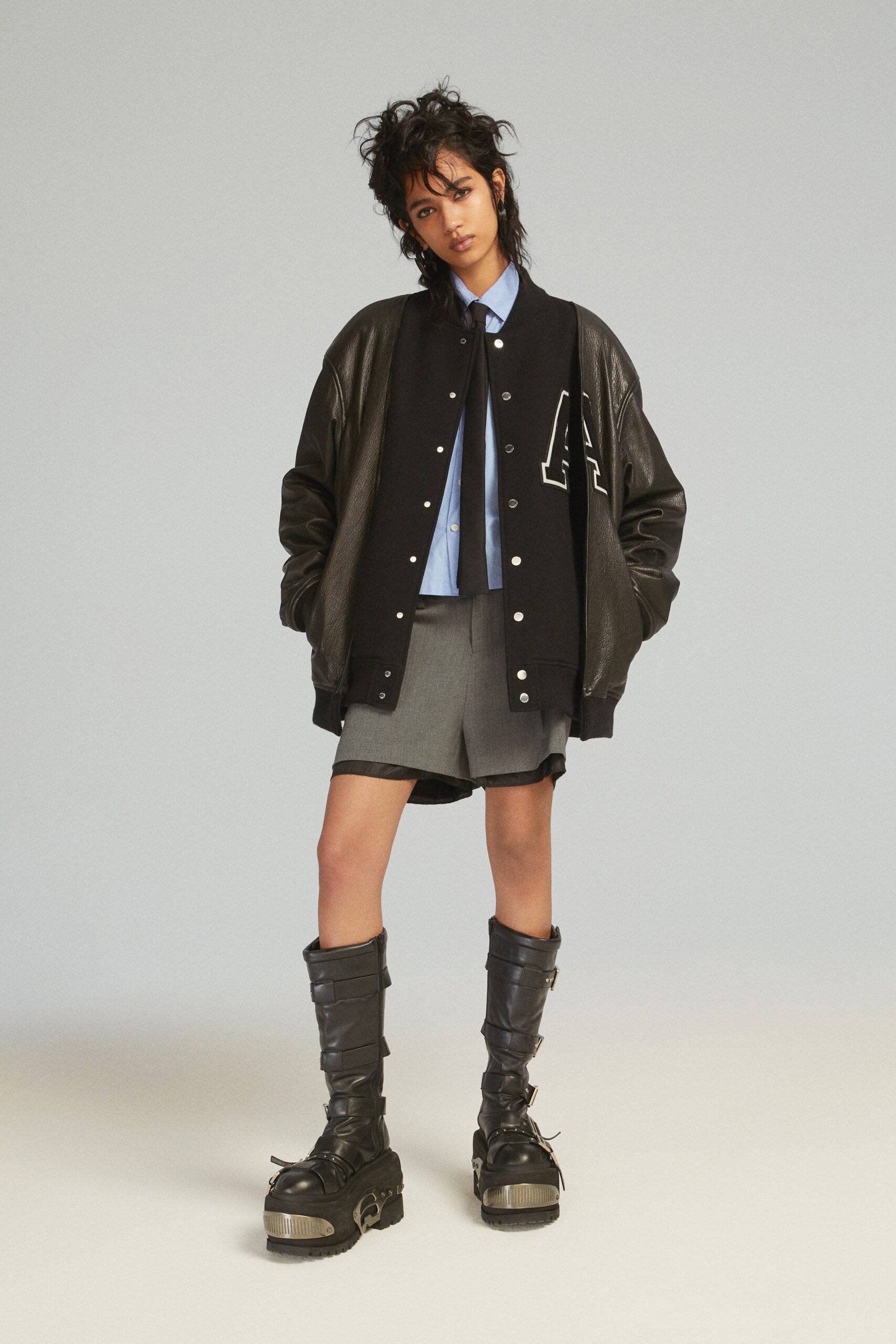 black leather long-sleeve collared oversized zippered jacket