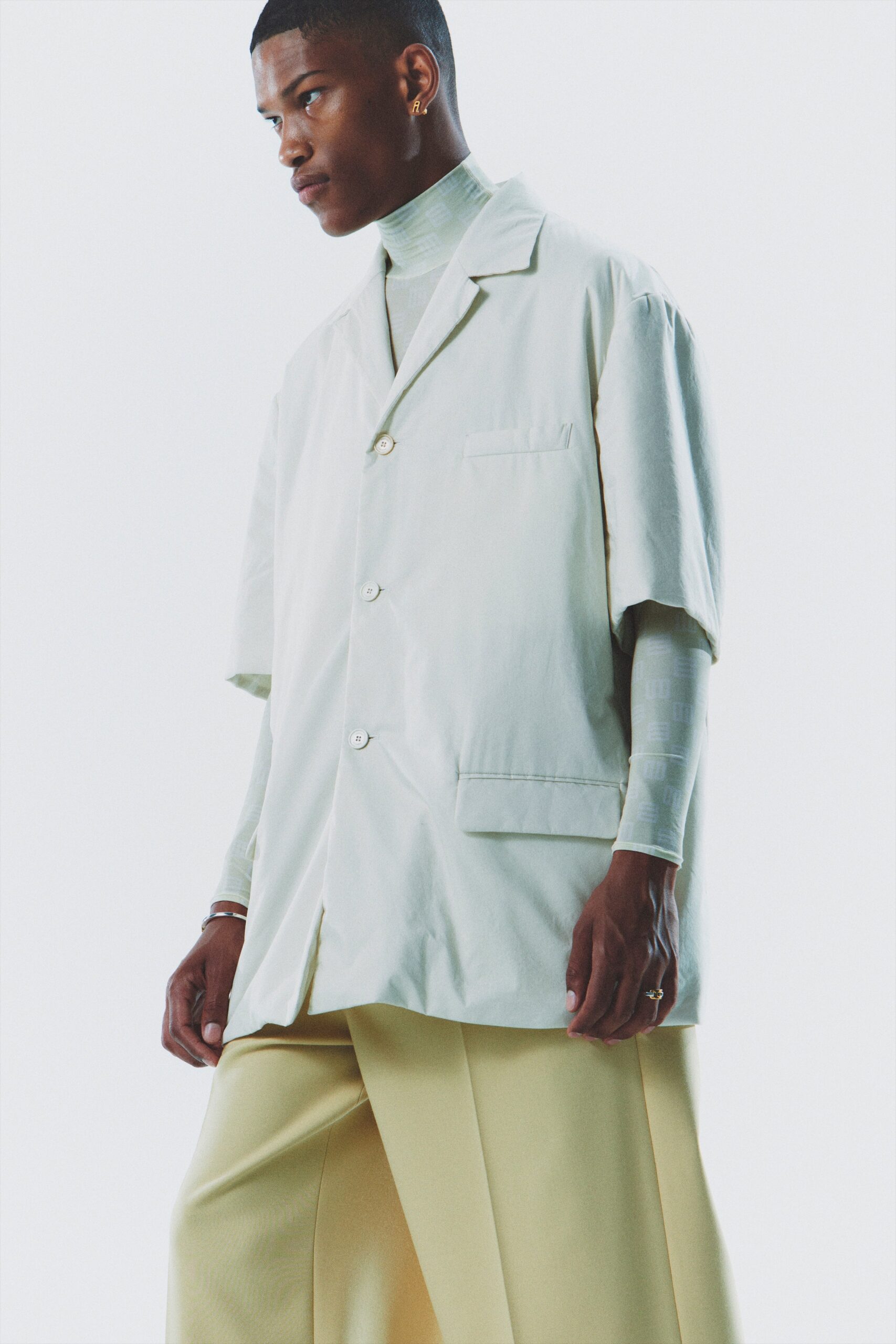 light green shirt and yellow pants