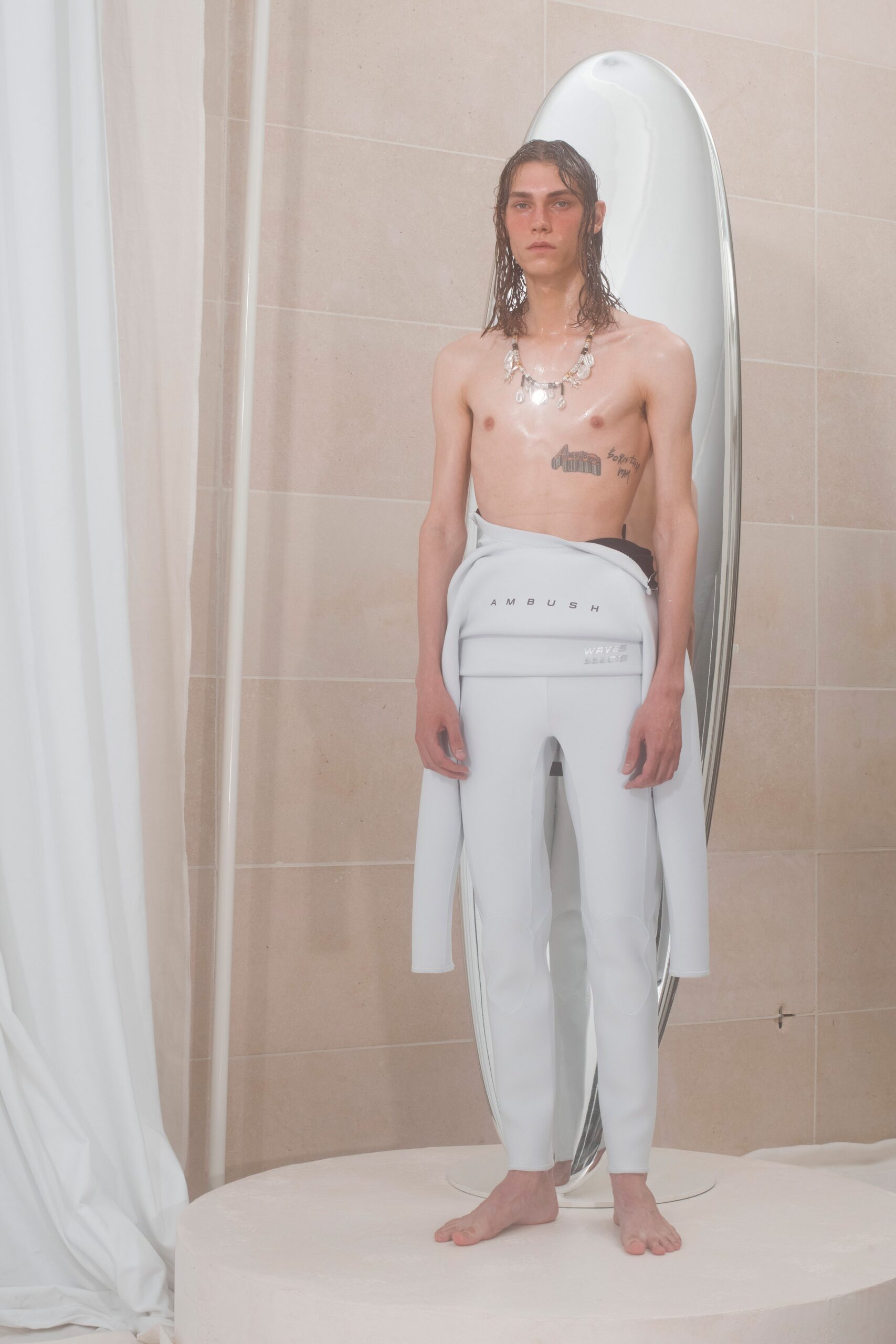white neoprene long-sleeve fitted zippered pants