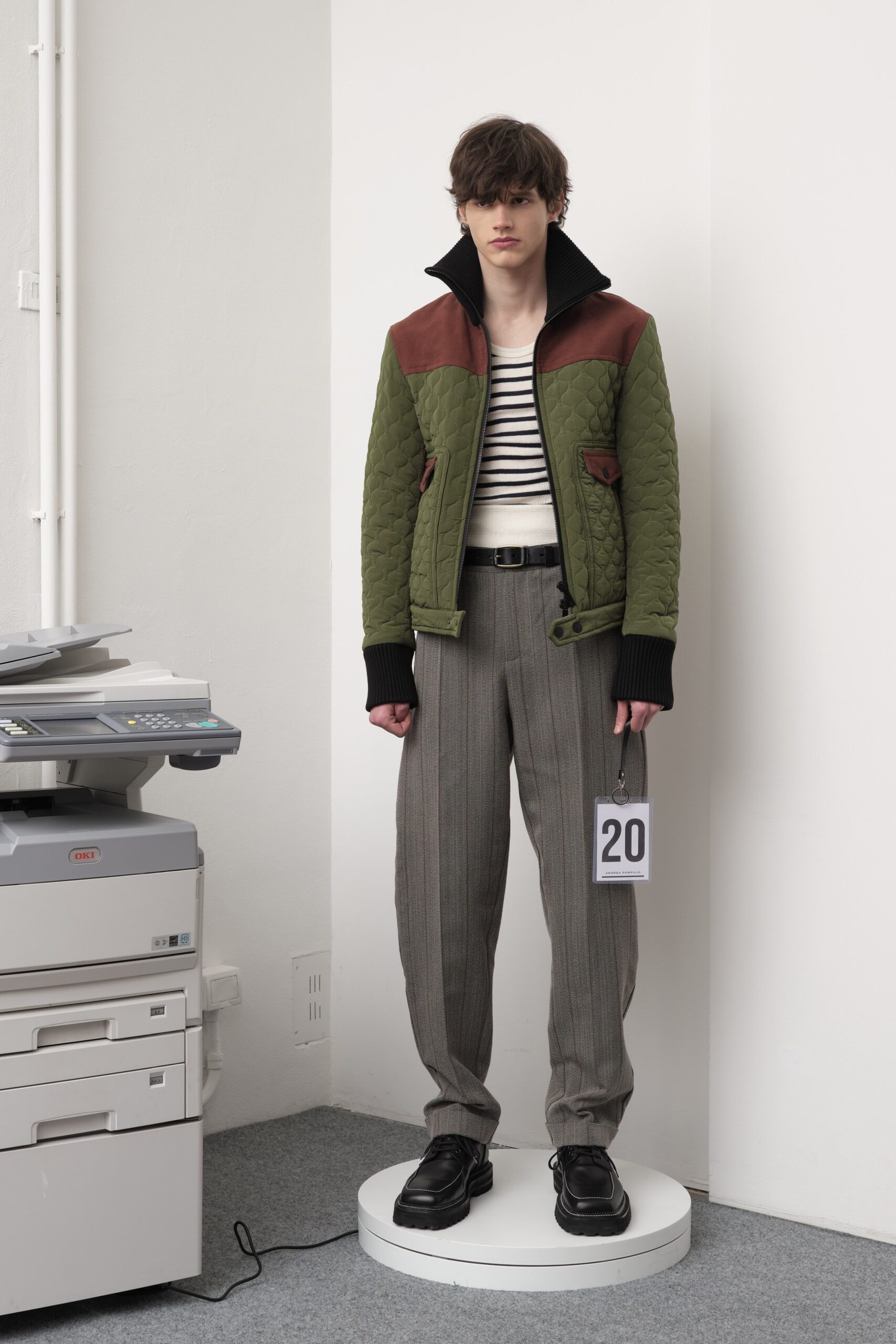 green quilted jacket with striped shirt