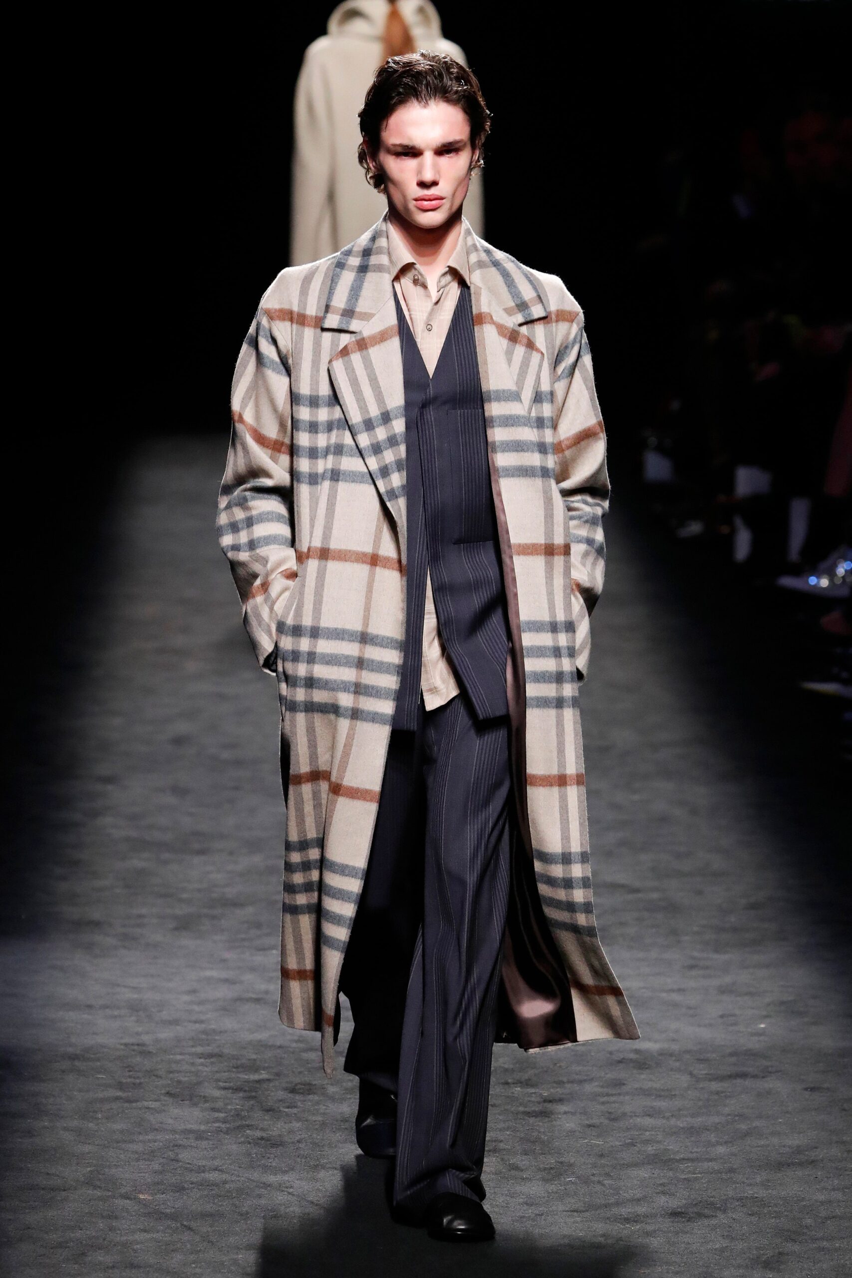 beige checked coat with tailored suit