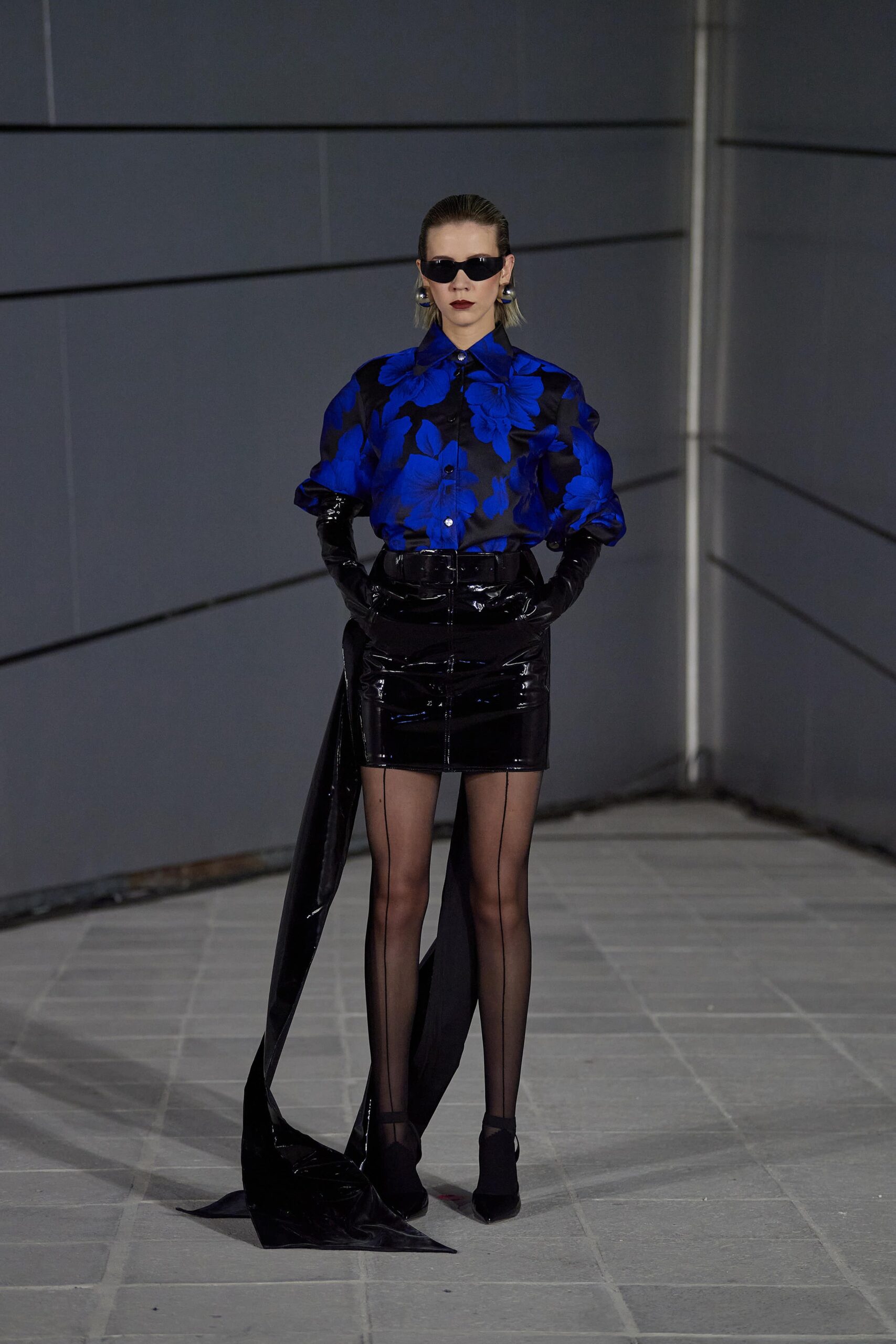 blue silk shirt with black vinyl skirt