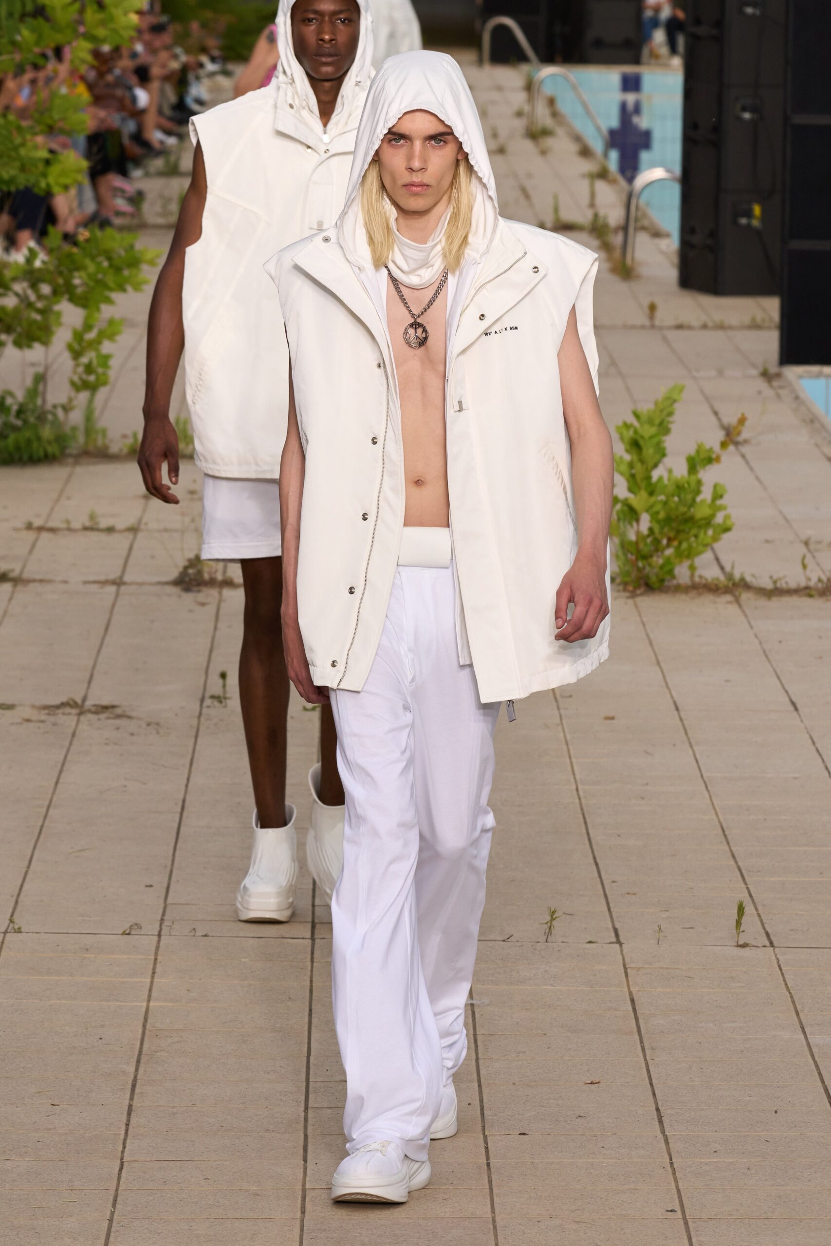 white sleeveless hoodie and pants