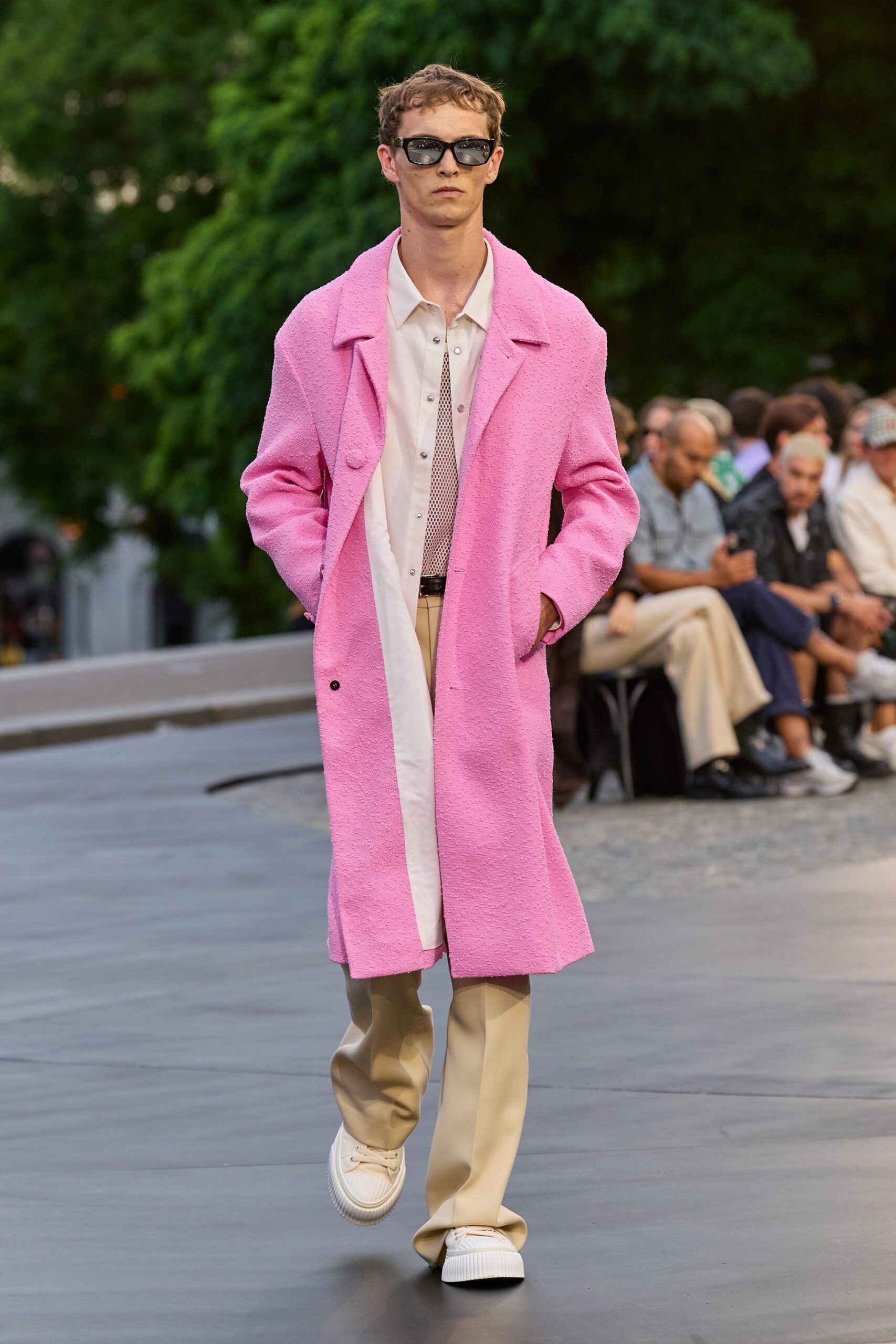 pink wool coat with beige pants