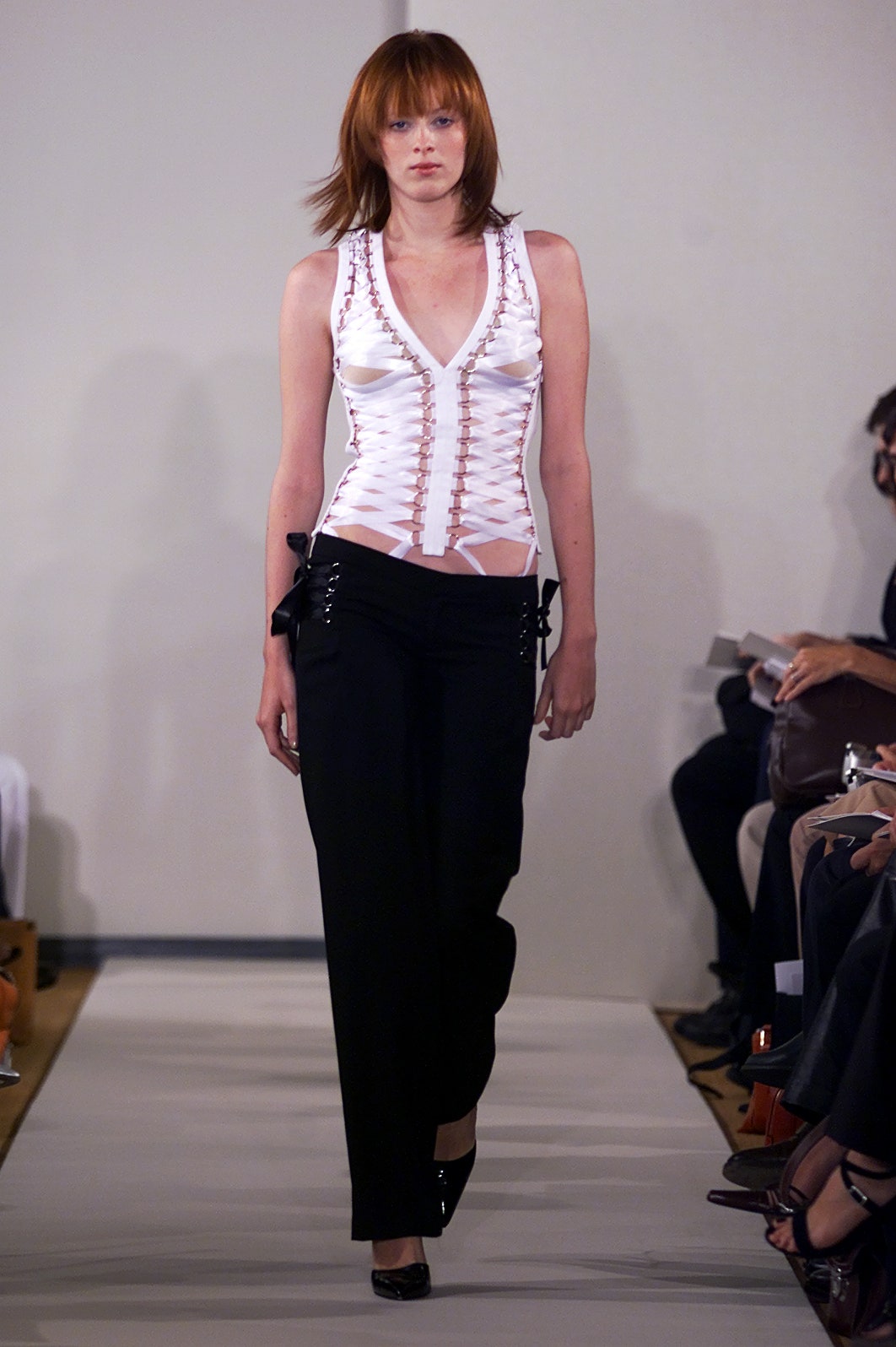 fitted white silk top and black pants