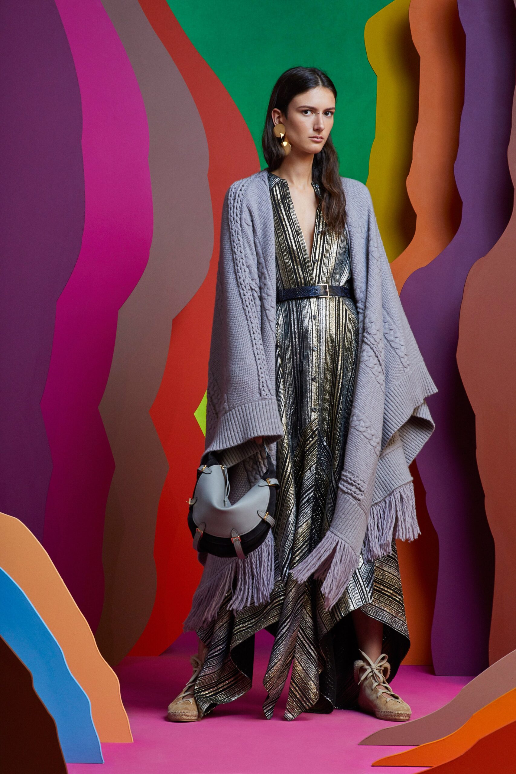 gold and black maxi dress with lavender cape